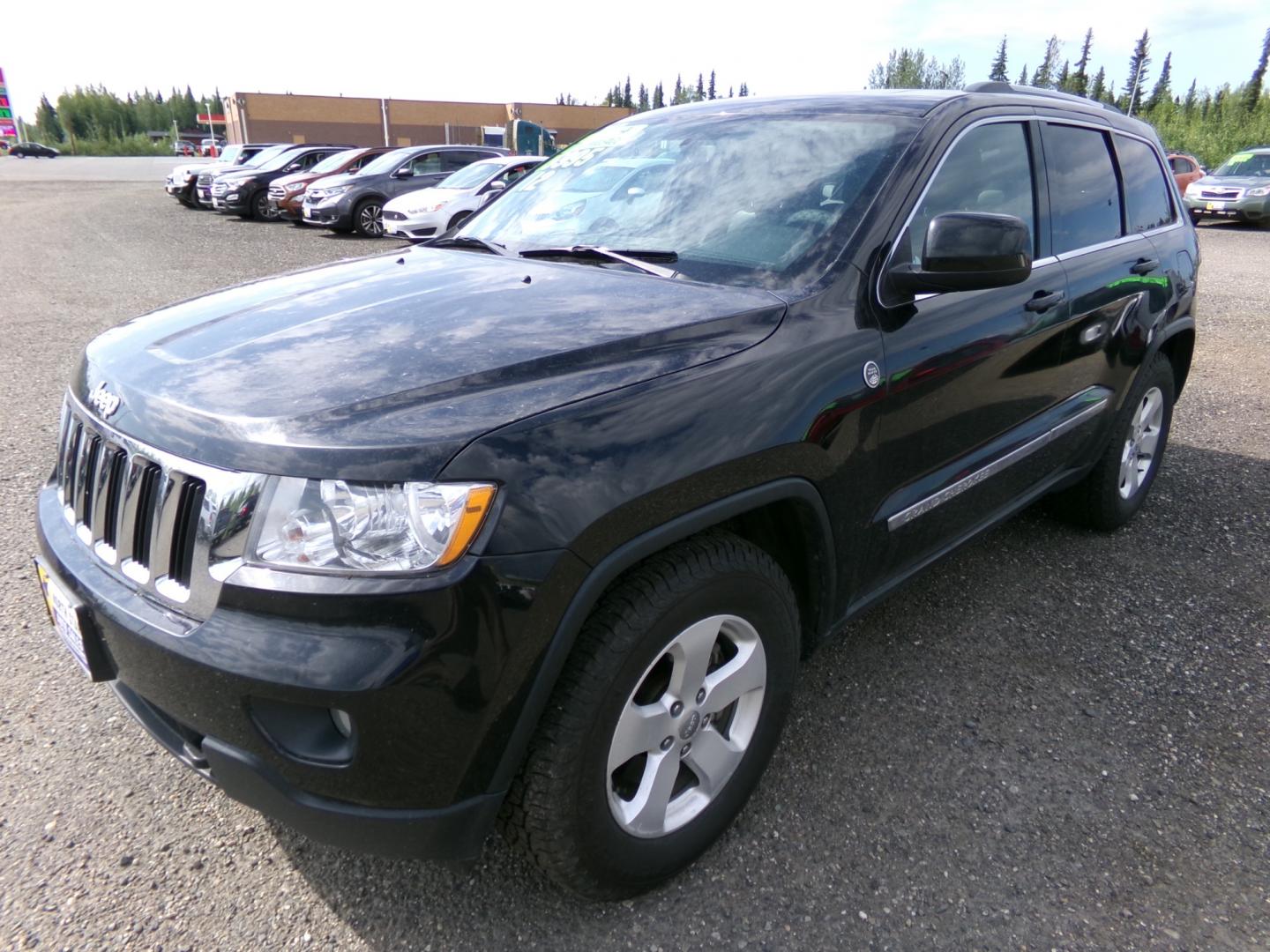 2012 Black Jeep Grand Cherokee Laredo 4WD (1C4RJFAG5CC) with an 3.6L V6 DOHC 24V engine, 5-Speed Automatic transmission, located at 2630 Philips Field Rd., Fairbanks, AK, 99709, (907) 458-0593, 64.848068, -147.780609 - Photo#0