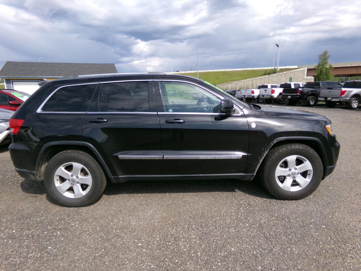 2012 Black Jeep Grand Cherokee Laredo 4WD (1C4RJFAG5CC) with an 3.6L V6 DOHC 24V engine, 5-Speed Automatic transmission, located at 2630 Philips Field Rd., Fairbanks, AK, 99709, (907) 458-0593, 64.848068, -147.780609 - Photo#2