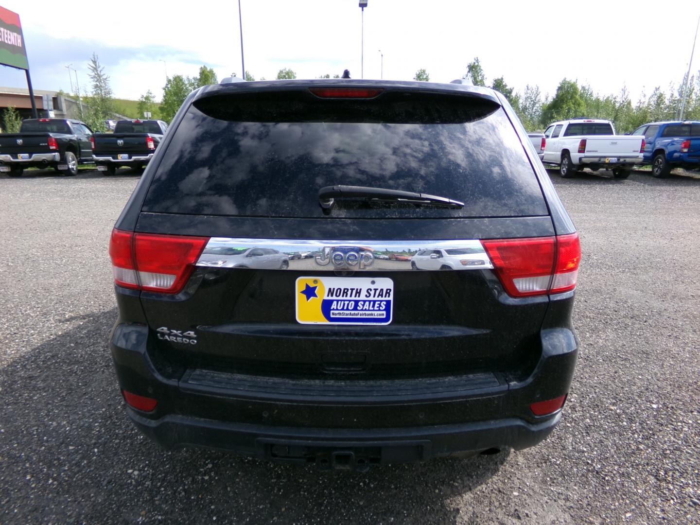 2012 Black Jeep Grand Cherokee Laredo 4WD (1C4RJFAG5CC) with an 3.6L V6 DOHC 24V engine, 5-Speed Automatic transmission, located at 2630 Philips Field Rd., Fairbanks, AK, 99709, (907) 458-0593, 64.848068, -147.780609 - Photo#3