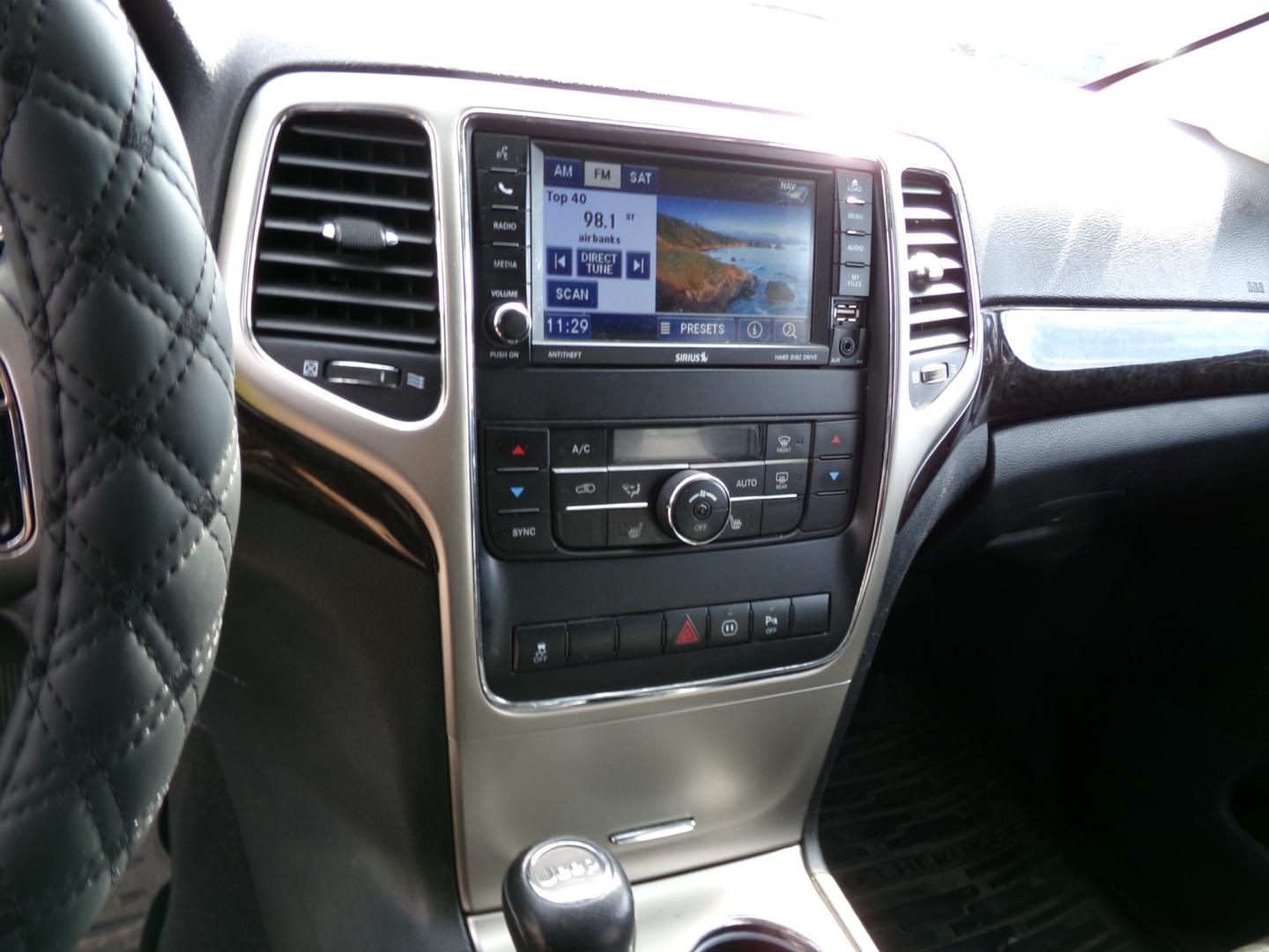 2012 Black Jeep Grand Cherokee Laredo 4WD (1C4RJFAG5CC) with an 3.6L V6 DOHC 24V engine, 5-Speed Automatic transmission, located at 2630 Philips Field Rd., Fairbanks, AK, 99709, (907) 458-0593, 64.848068, -147.780609 - Photo#5