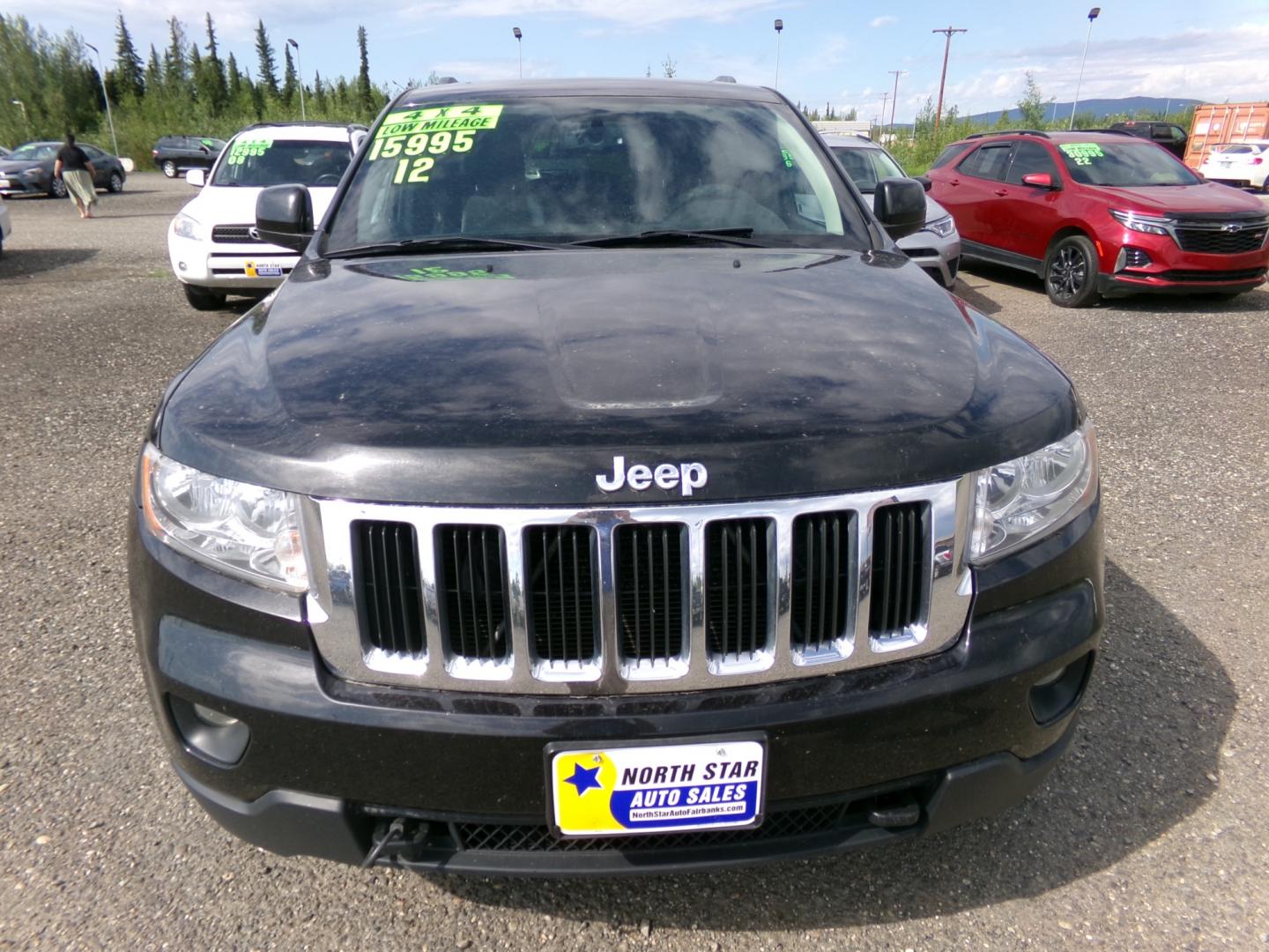 2012 Black Jeep Grand Cherokee Laredo 4WD (1C4RJFAG5CC) with an 3.6L V6 DOHC 24V engine, 5-Speed Automatic transmission, located at 2630 Philips Field Rd., Fairbanks, AK, 99709, (907) 458-0593, 64.848068, -147.780609 - Photo#1