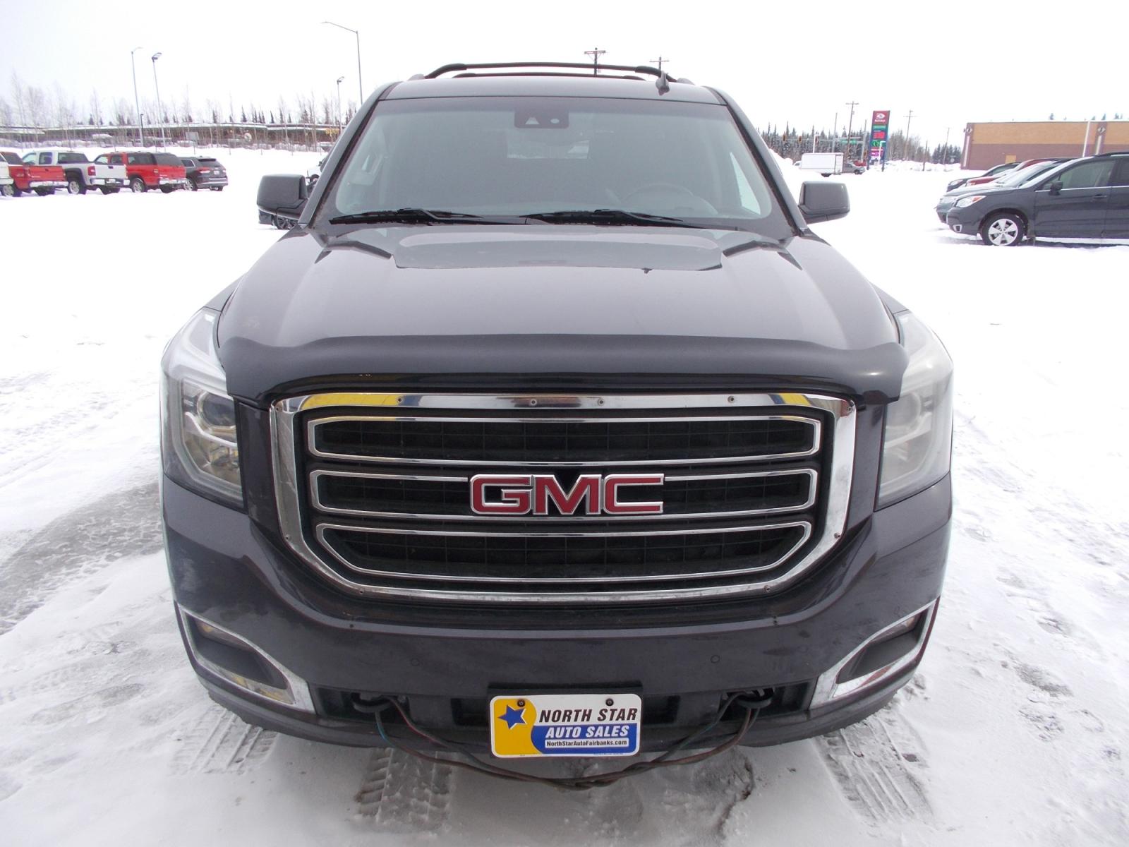 2015 Black GMC Yukon XL SLT 1/2 Ton 4WD (1GKS2HKC6FR) with an 5.3L V8 OHV 16V engine, 6-Speed Automatic transmission, located at 2630 Philips Field Rd., Fairbanks, AK, 99709, (907) 458-0593, 64.848068, -147.780609 - Photo #1