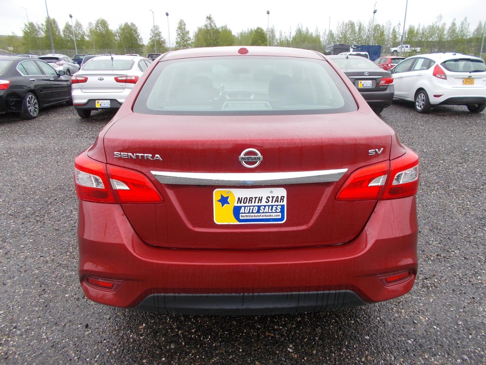 2017 Red Nissan Sentra S 6MT (3N1AB7AP6HL) with an 1.8L L4 SFI DOHC 16V engine, 6M transmission, located at 2630 Philips Field Rd., Fairbanks, AK, 99709, (907) 458-0593, 64.848068, -147.780609 - Photo #3