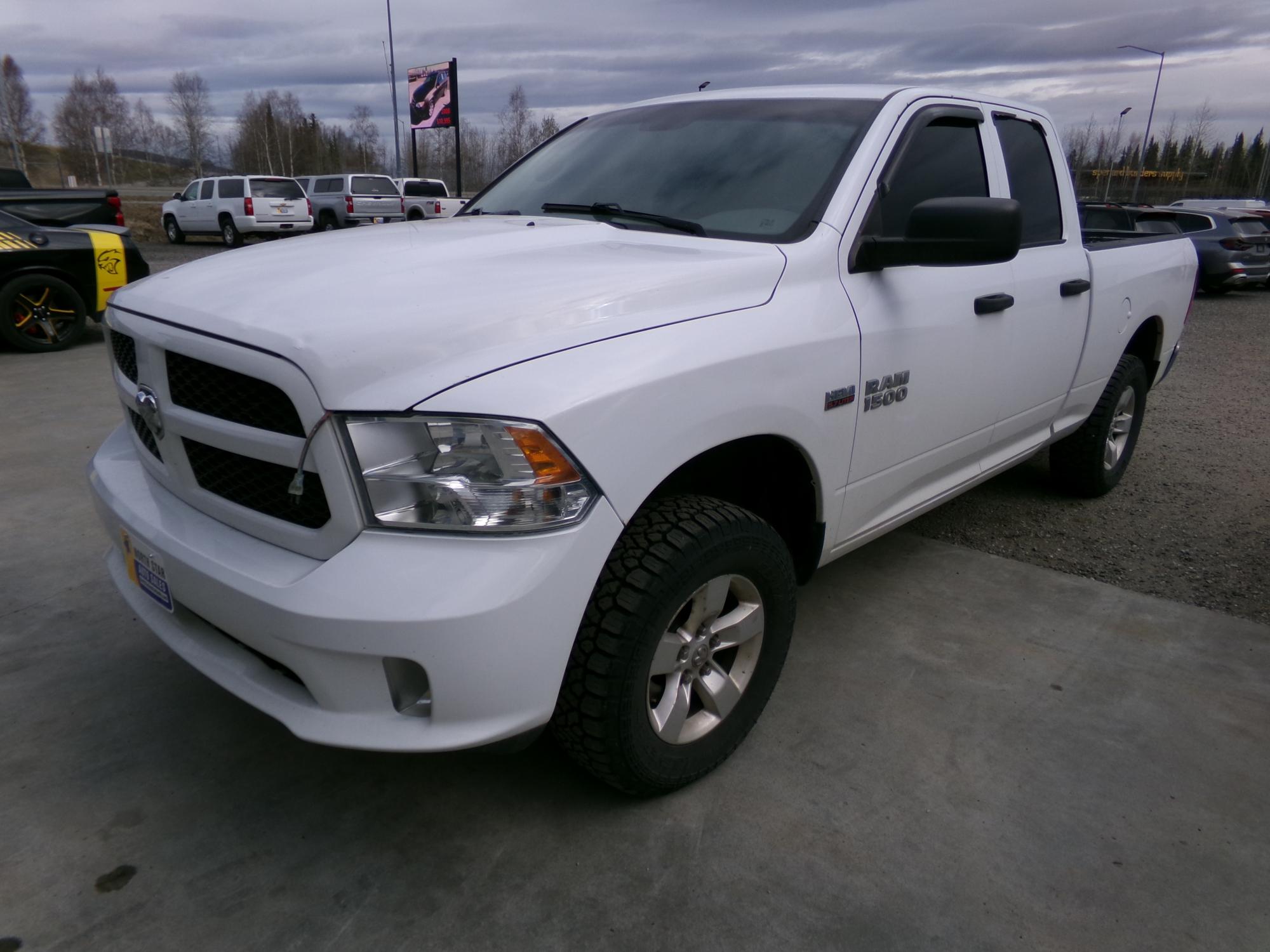 photo of 2016 RAM 1500 TQuad Cab 4WD