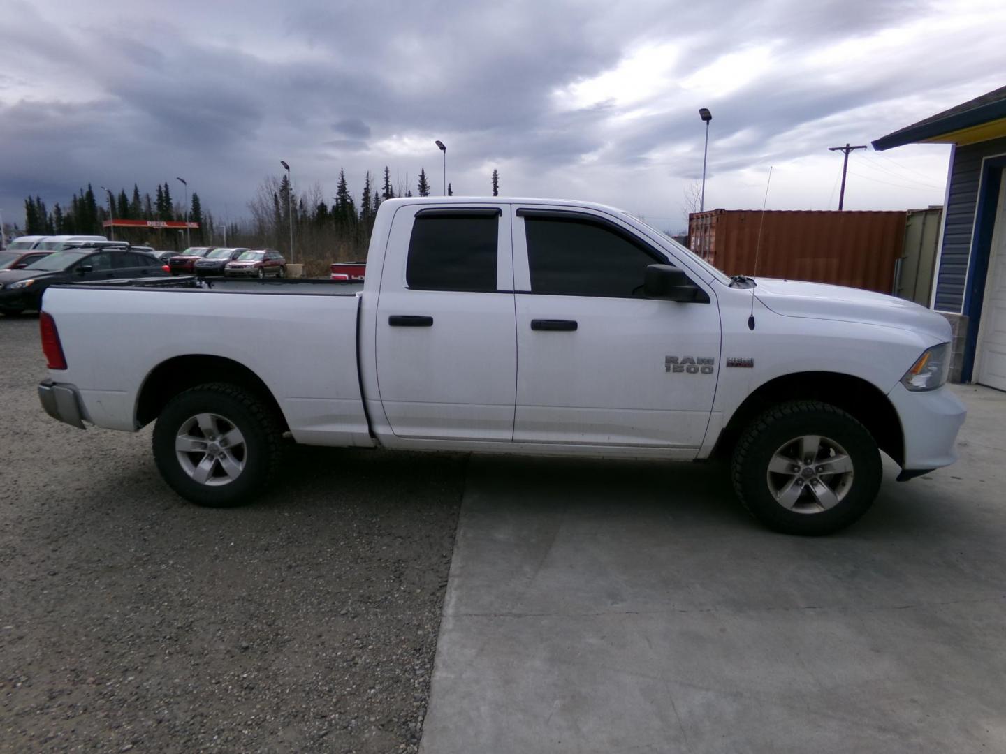 2016 White Dodge 1500 Tradesman Quad Cab 4WD (1C6RR7FTXGS) with an 5.7L V8 OHV 16V engine, 6A transmission, located at 2630 Philips Field Rd., Fairbanks, AK, 99709, (907) 458-0593, 64.848068, -147.780609 - Photo#2