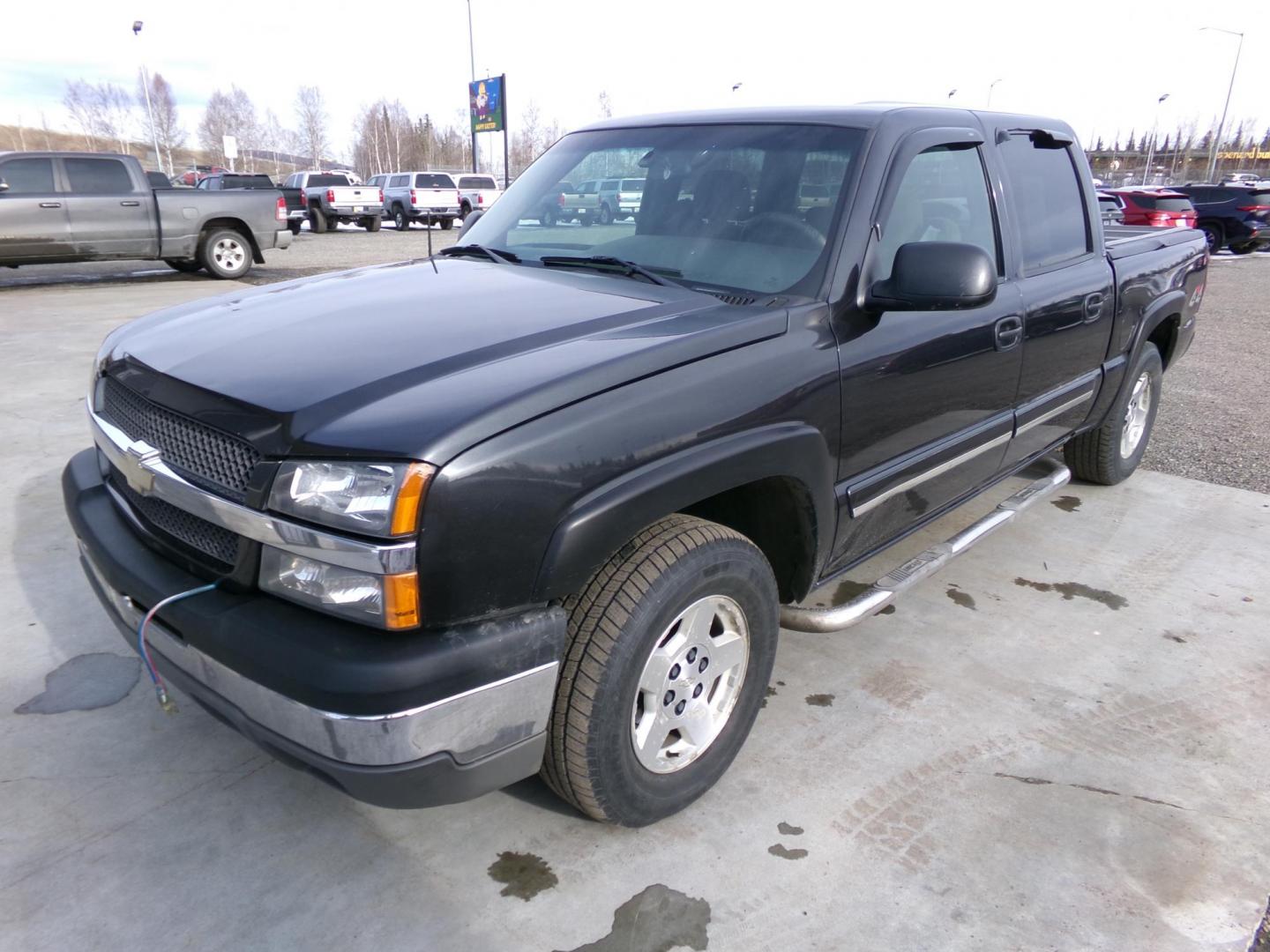2004 Grey Chevrolet Silverado 1500 LS Crew Cab 4WD (2GCEK13T141) with an 5.3L V8 OHV 16V engine, 4-Speed Automatic Overdrive transmission, located at 2630 Philips Field Rd., Fairbanks, AK, 99709, (907) 458-0593, 64.848068, -147.780609 - Photo#0
