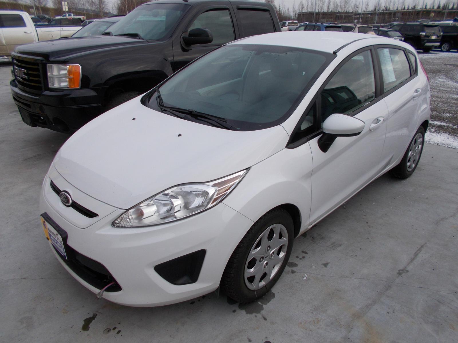 2013 White Ford Fiesta S Hatchback (3FADP4TJXDM) with an 1.6L L4 DOHC 16V engine, located at 2630 Philips Field Rd., Fairbanks, AK, 99709, (907) 458-0593, 64.848068, -147.780609 - Photo #0