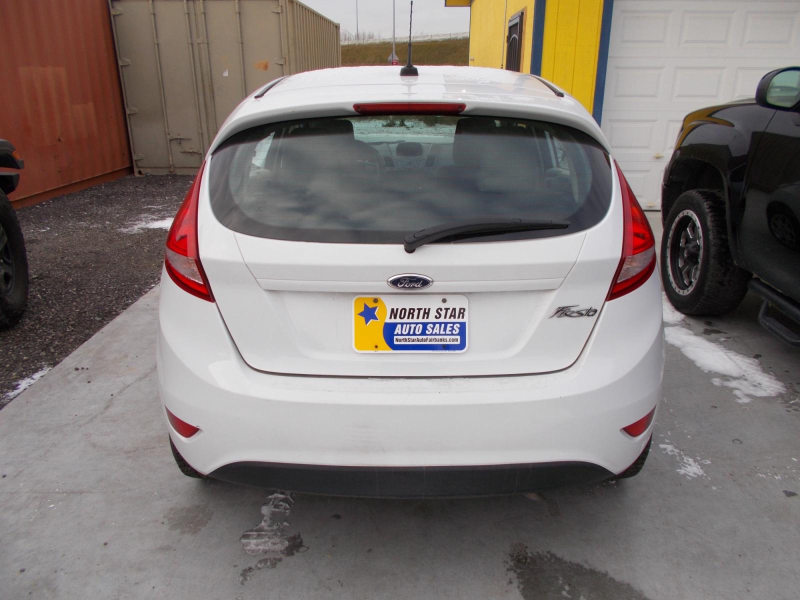 2013 White Ford Fiesta S Hatchback (3FADP4TJXDM) with an 1.6L L4 DOHC 16V engine, located at 2630 Philips Field Rd., Fairbanks, AK, 99709, (907) 458-0593, 64.848068, -147.780609 - Photo #2