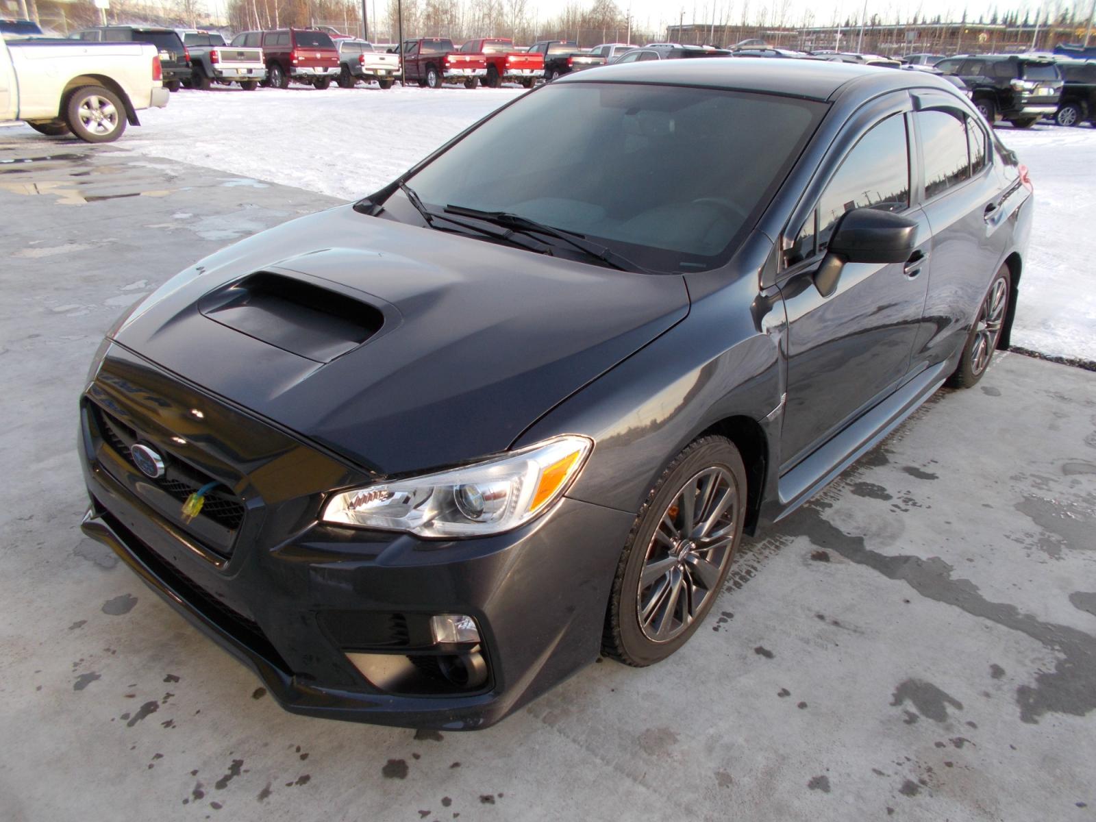 2015 Grey Subaru WRX 4-Door (JF1VA1A69F9) with an 2.0L H4 DOHC 16V engine, 6-Speed Manual transmission, located at 2630 Philips Field Rd., Fairbanks, AK, 99709, (907) 458-0593, 64.848068, -147.780609 - Photo #0