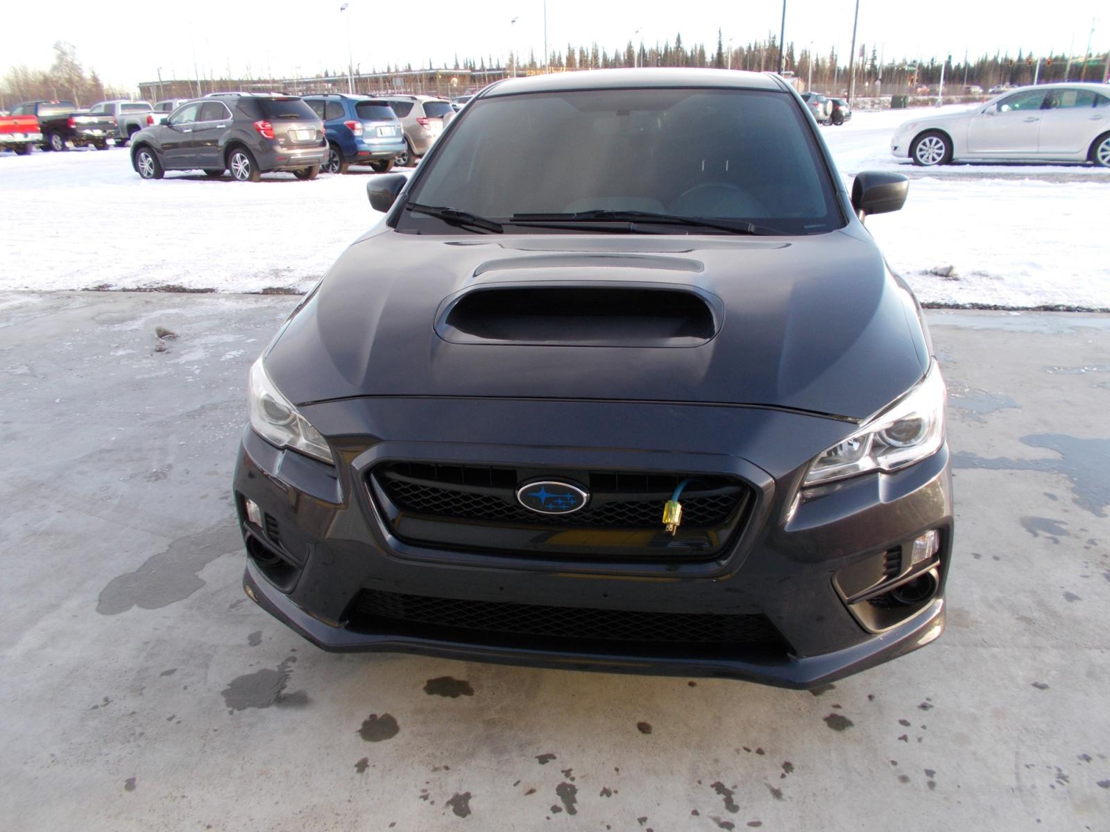 2015 Grey Subaru WRX 4-Door (JF1VA1A69F9) with an 2.0L H4 DOHC 16V engine, 6-Speed Manual transmission, located at 2630 Philips Field Rd., Fairbanks, AK, 99709, (907) 458-0593, 64.848068, -147.780609 - Photo #1