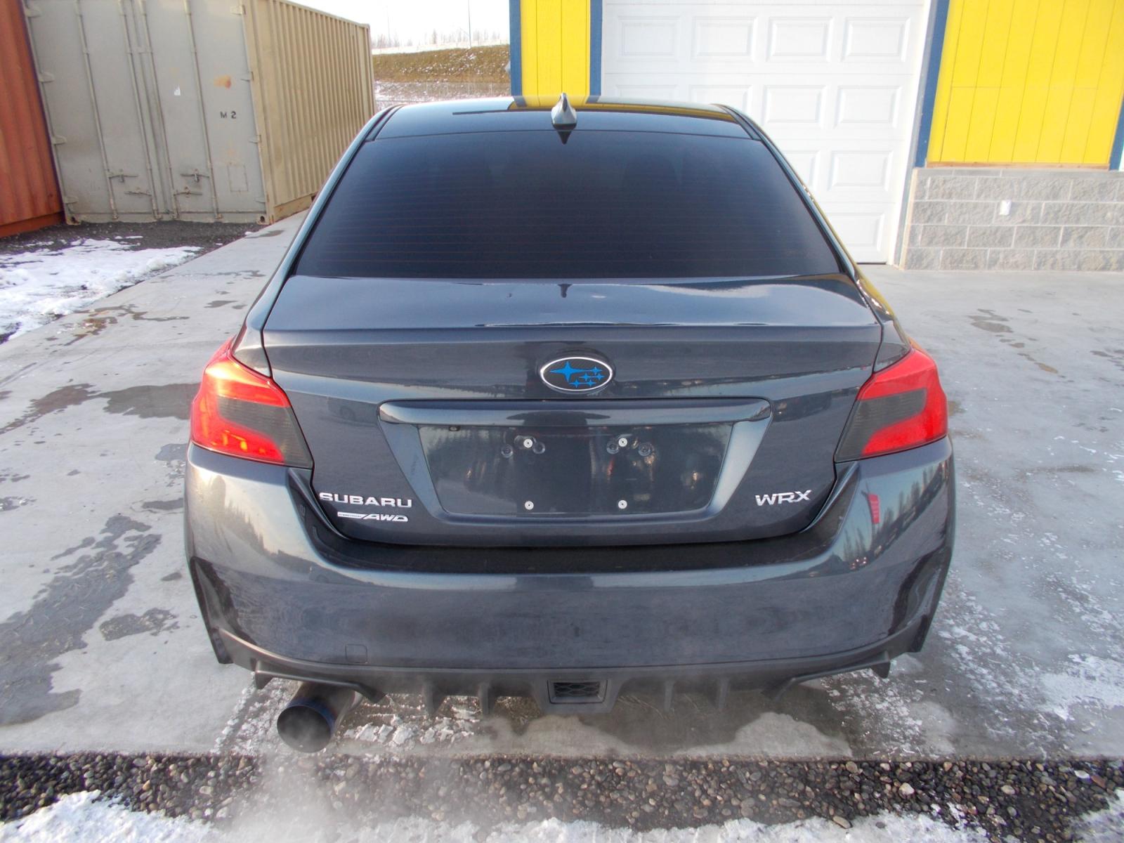2015 Grey Subaru WRX 4-Door (JF1VA1A69F9) with an 2.0L H4 DOHC 16V engine, 6-Speed Manual transmission, located at 2630 Philips Field Rd., Fairbanks, AK, 99709, (907) 458-0593, 64.848068, -147.780609 - Photo #3