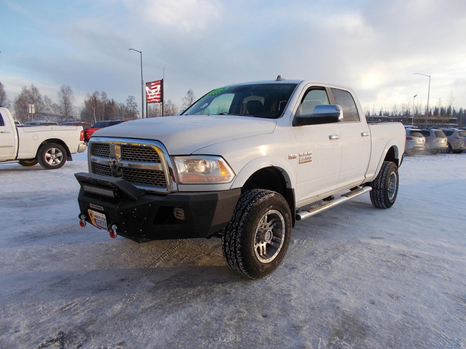 2016 White Dodge 2500 Laramie Crew Cab SWB 4WD (3C6TR5FJ8GG) with an 6.7L L6 engine, 6A transmission, located at 2630 Philips Field Rd., Fairbanks, AK, 99709, (907) 458-0593, 64.848068, -147.780609 - Photo #0