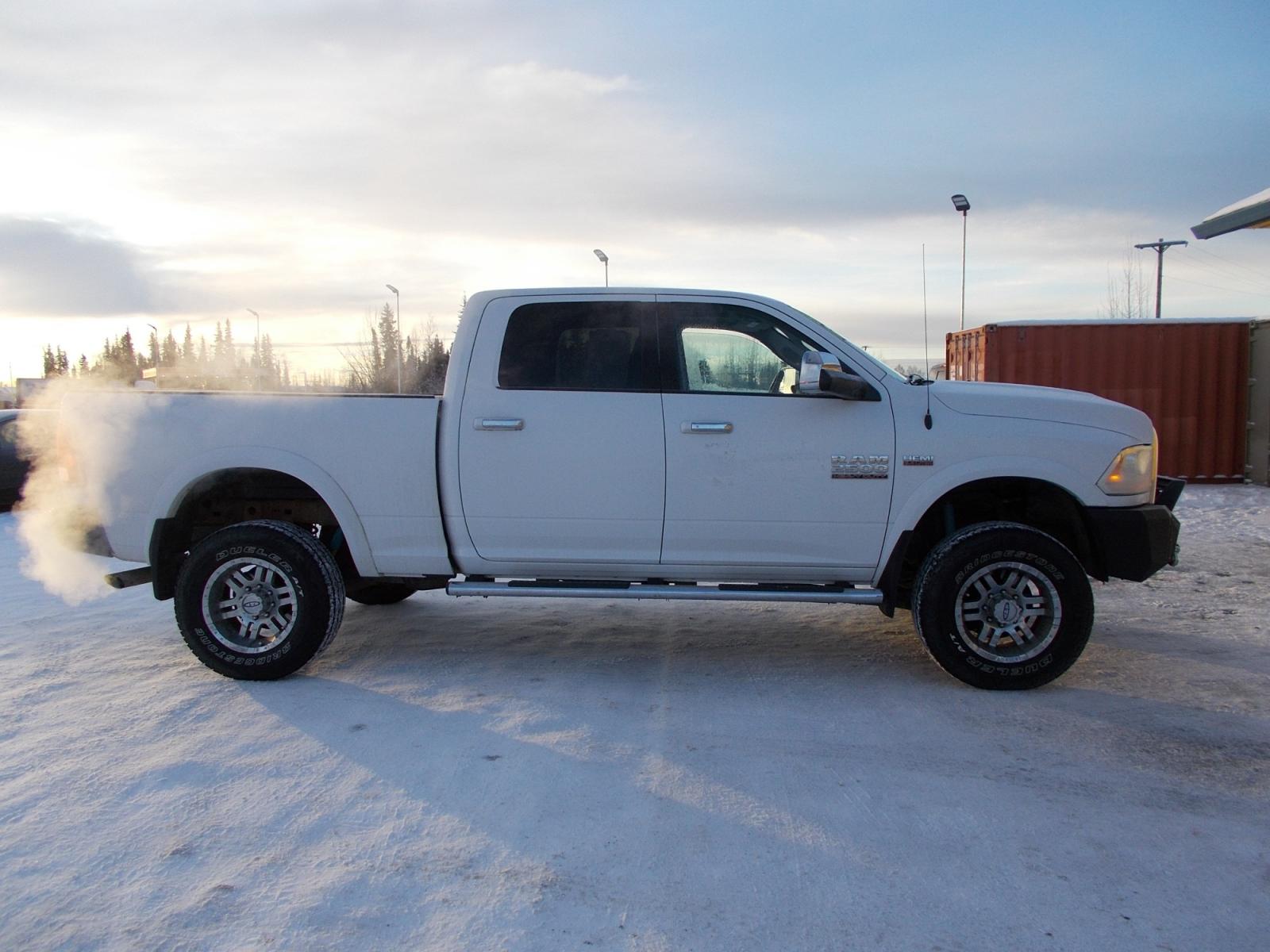 2016 White Dodge 2500 Laramie Crew Cab SWB 4WD (3C6TR5FJ8GG) with an 6.7L L6 engine, 6A transmission, located at 2630 Philips Field Rd., Fairbanks, AK, 99709, (907) 458-0593, 64.848068, -147.780609 - Photo #2