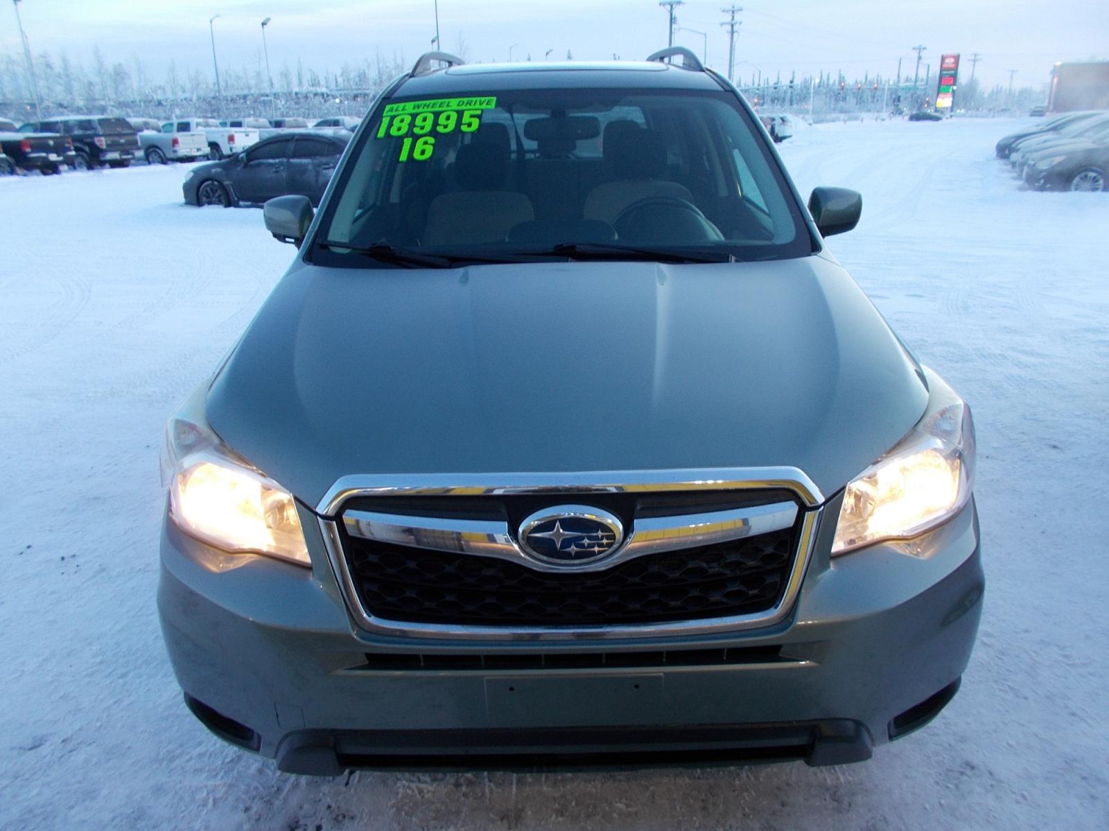 2016 Blue Subaru Forester 2.5i Premium PZEV CVT (JF2SJADC1GH) with an 2.5L H4 SOHC 16V engine, CVT transmission, located at 2630 Philips Field Rd., Fairbanks, AK, 99709, (907) 458-0593, 64.848068, -147.780609 - Photo #1