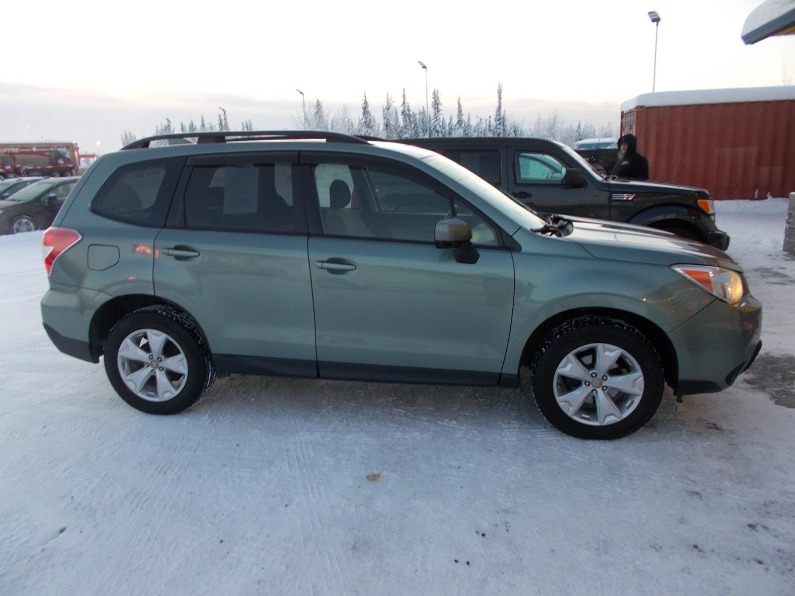 2016 Blue Subaru Forester 2.5i Premium PZEV CVT (JF2SJADC1GH) with an 2.5L H4 SOHC 16V engine, CVT transmission, located at 2630 Philips Field Rd., Fairbanks, AK, 99709, (907) 458-0593, 64.848068, -147.780609 - Photo #2