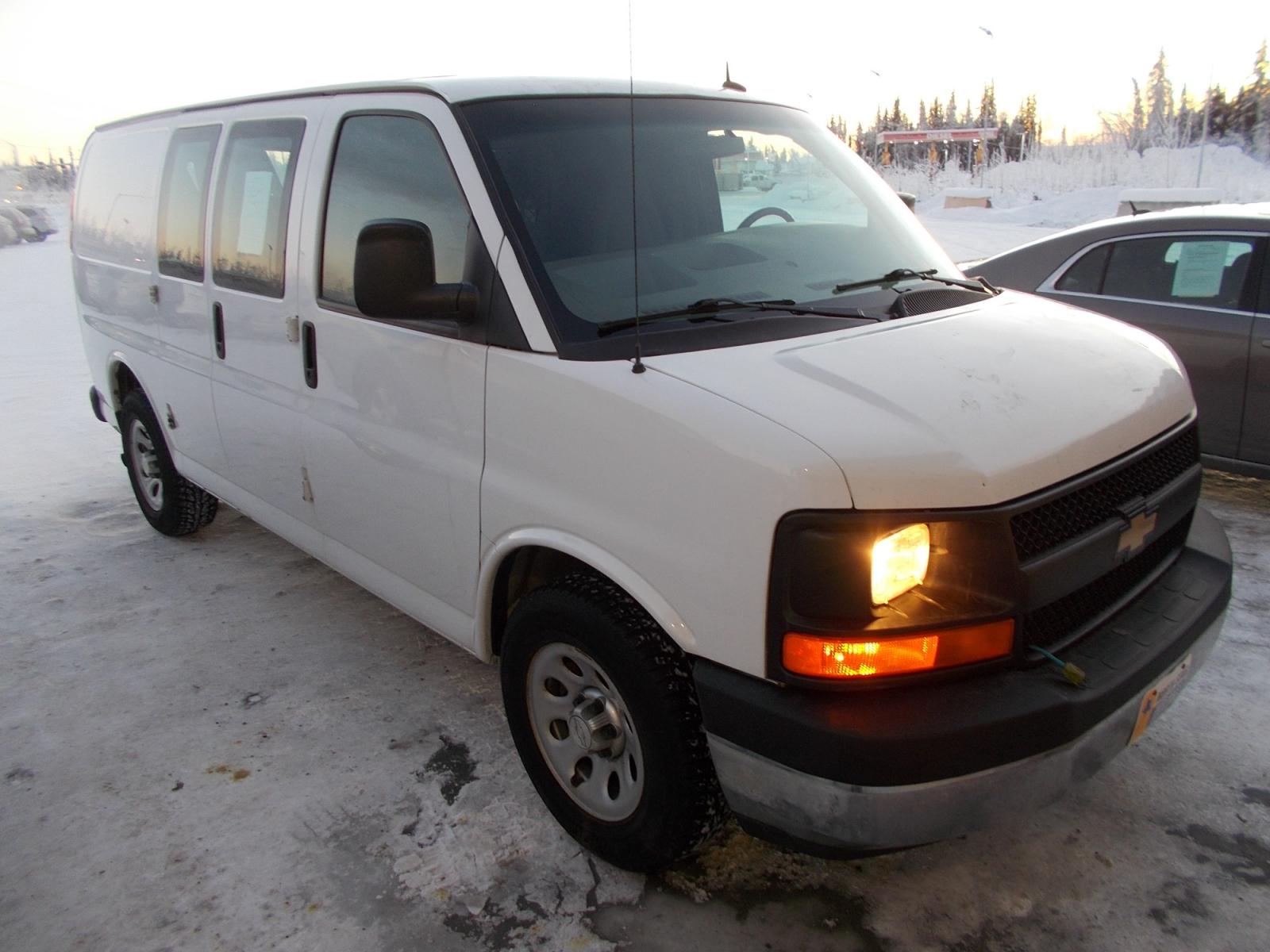 2014 White Chevrolet Express 1500 AWD Cargo (1GCSHAF44E1) with an 5.3L V8 OHV 16V engine, 4-Speed Automatic transmission, located at 2630 Philips Field Rd., Fairbanks, AK, 99709, (907) 458-0593, 64.848068, -147.780609 - Photo #0