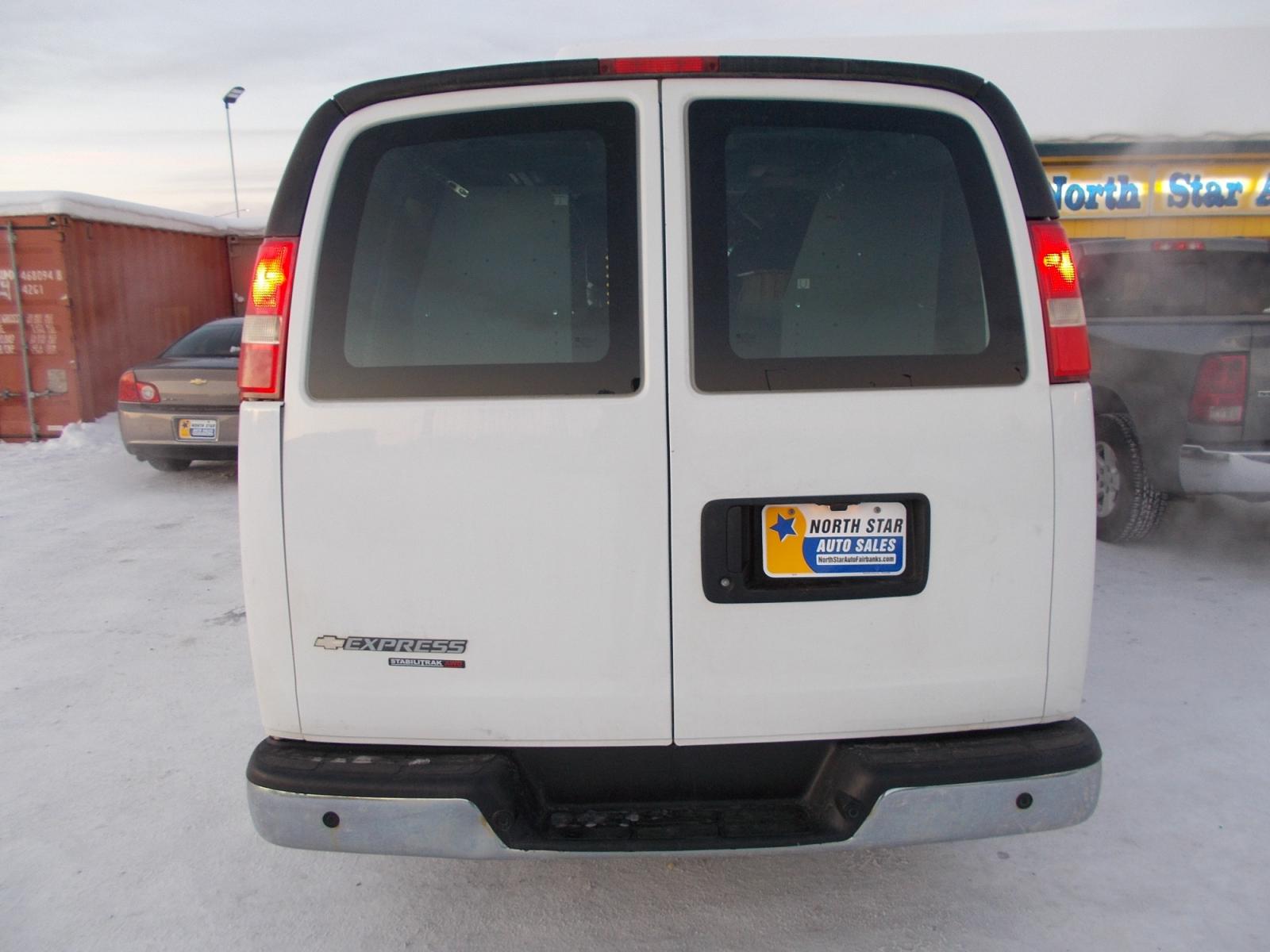 2014 White Chevrolet Express 1500 AWD Cargo (1GCSHAF44E1) with an 5.3L V8 OHV 16V engine, 4-Speed Automatic transmission, located at 2630 Philips Field Rd., Fairbanks, AK, 99709, (907) 458-0593, 64.848068, -147.780609 - Photo #3
