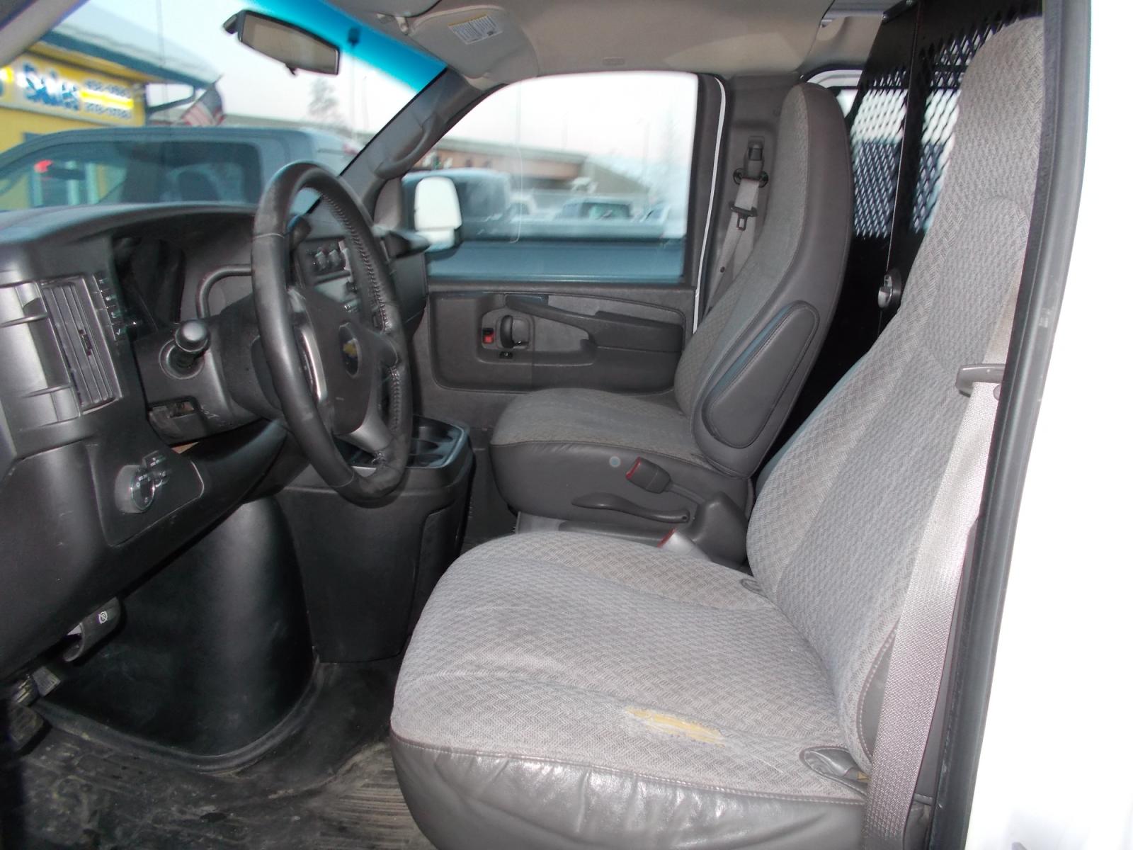 2014 White Chevrolet Express 1500 AWD Cargo (1GCSHAF44E1) with an 5.3L V8 OHV 16V engine, 4-Speed Automatic transmission, located at 2630 Philips Field Rd., Fairbanks, AK, 99709, (907) 458-0593, 64.848068, -147.780609 - Photo #5