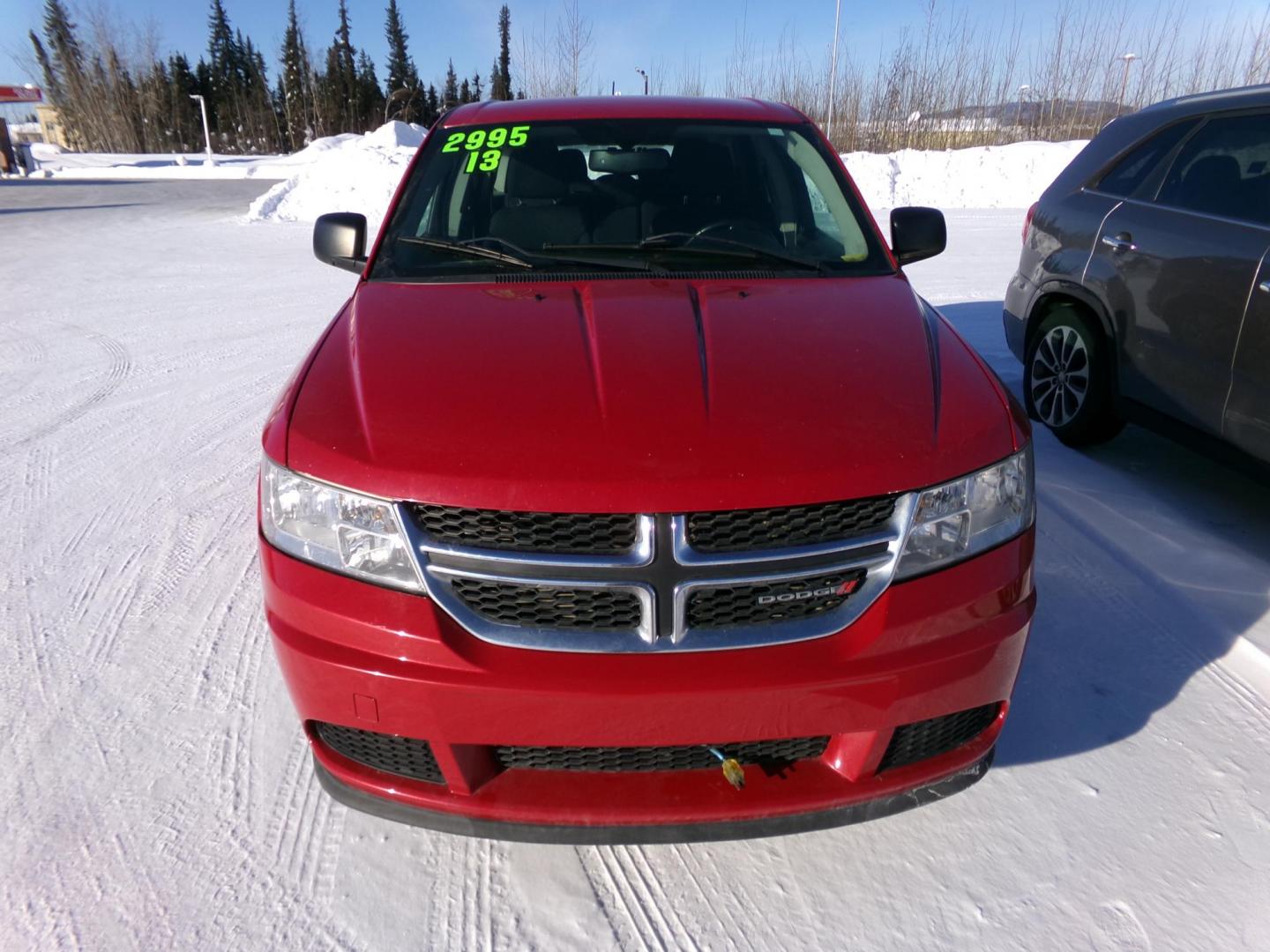2013 Red /Black Dodge Journey SE (3C4PDCAB3DT) with an 2.4L L4 DOHC 16V engine, 4-Speed Automatic transmission, located at 2630 Philips Field Rd., Fairbanks, AK, 99709, (907) 458-0593, 64.848068, -147.780609 - Photo#1