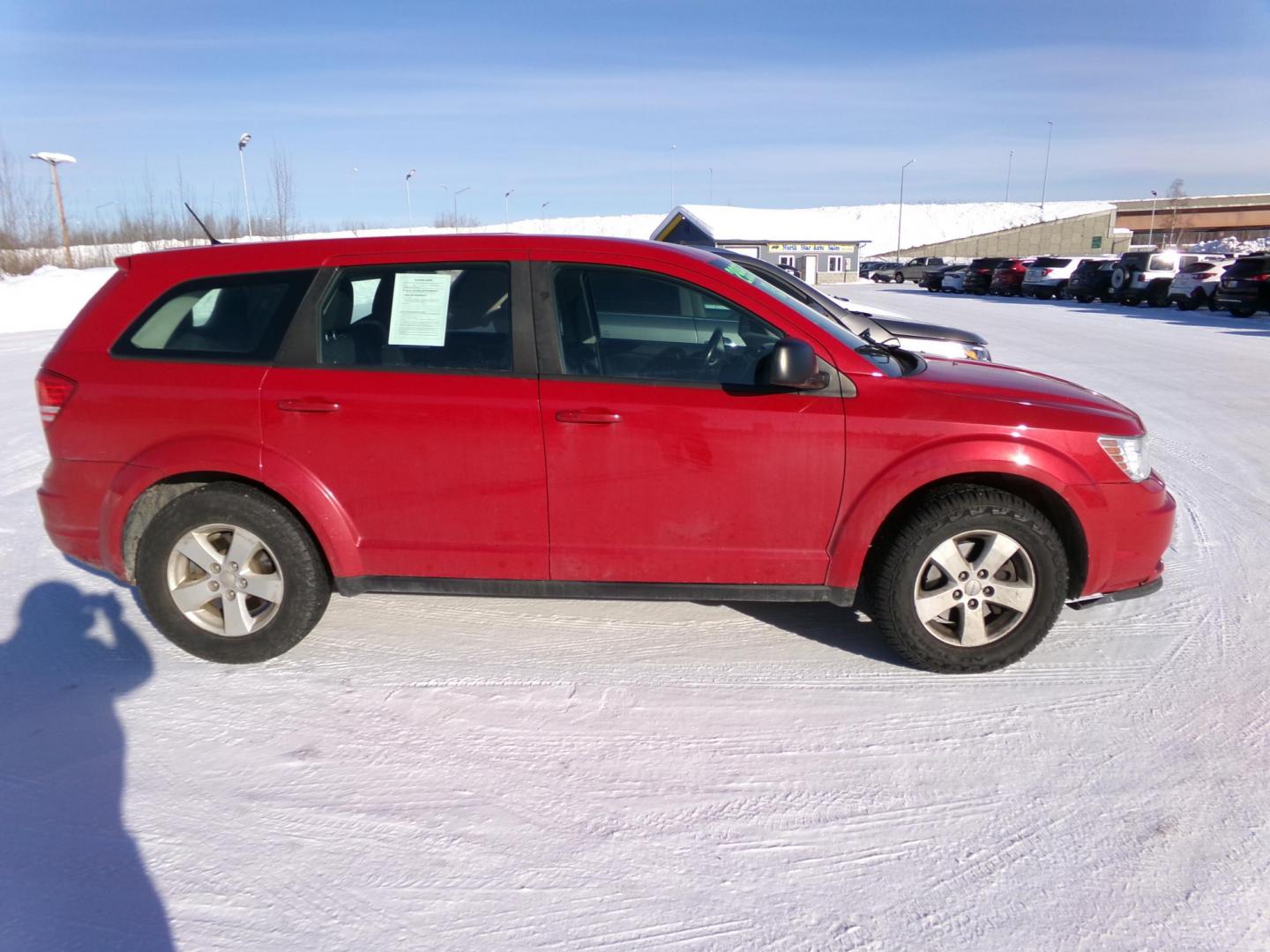 2013 Red /Black Dodge Journey SE (3C4PDCAB3DT) with an 2.4L L4 DOHC 16V engine, 4-Speed Automatic transmission, located at 2630 Philips Field Rd., Fairbanks, AK, 99709, (907) 458-0593, 64.848068, -147.780609 - Photo#2