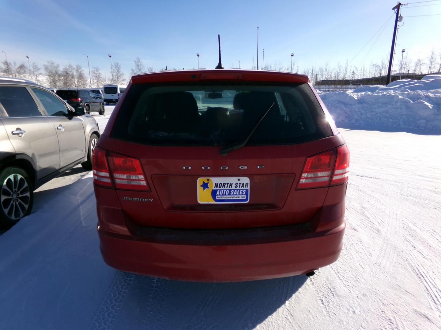 2013 Red /Black Dodge Journey SE (3C4PDCAB3DT) with an 2.4L L4 DOHC 16V engine, 4-Speed Automatic transmission, located at 2630 Philips Field Rd., Fairbanks, AK, 99709, (907) 458-0593, 64.848068, -147.780609 - Photo#3