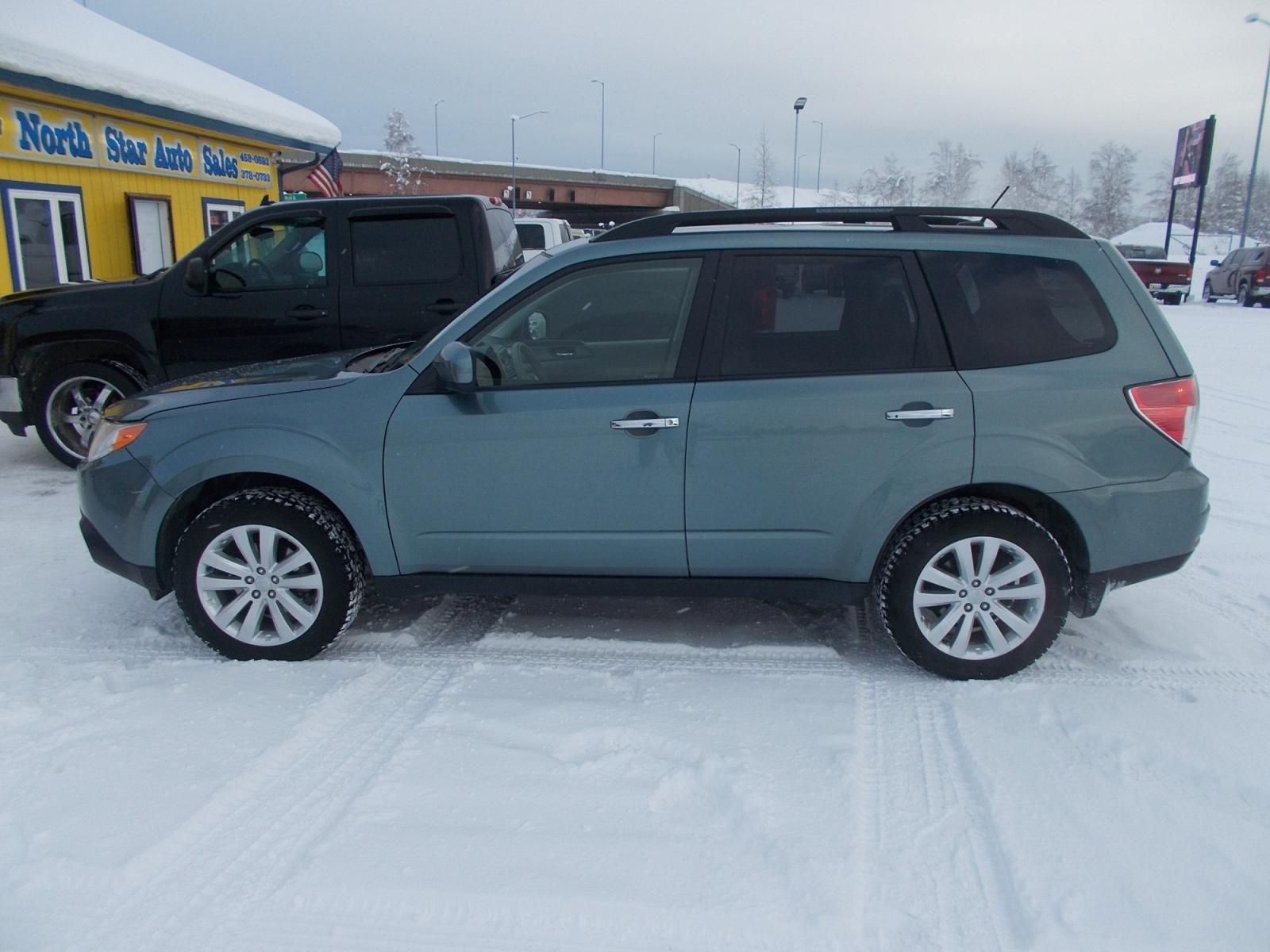 2011 Blue Subaru Forester 2.5X Premium (JF2SHADC4BH) with an 2.5L H4 SOHC 16V engine, 5-Speed Automatic transmission, located at 2630 Philips Field Rd., Fairbanks, AK, 99709, (907) 458-0593, 64.848068, -147.780609 - Photo #2