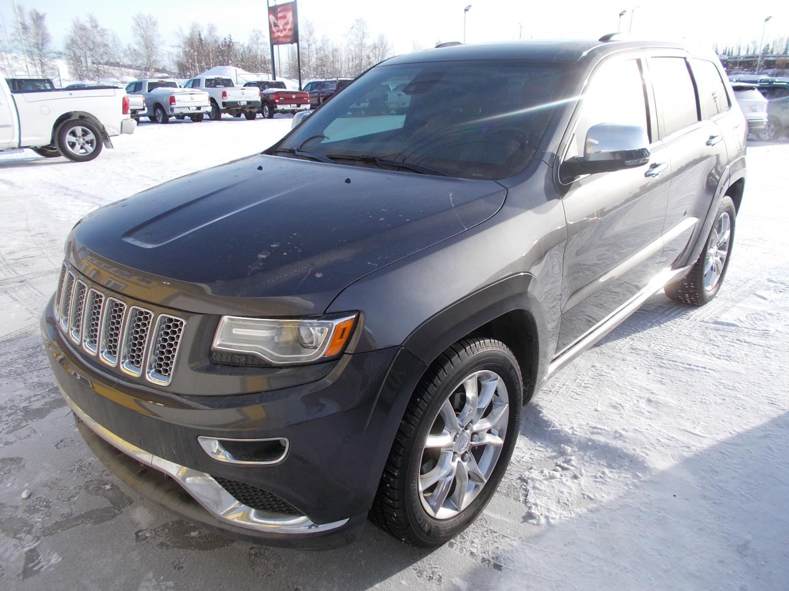 2015 Grey Jeep Grand Cherokee Summit 4WD (1C4RJFJG6FC) with an 3.6L V6 DOHC 24V engine, 8-Speed Automatic transmission, located at 2630 Philips Field Rd., Fairbanks, AK, 99709, (907) 458-0593, 64.848068, -147.780609 - Photo #0
