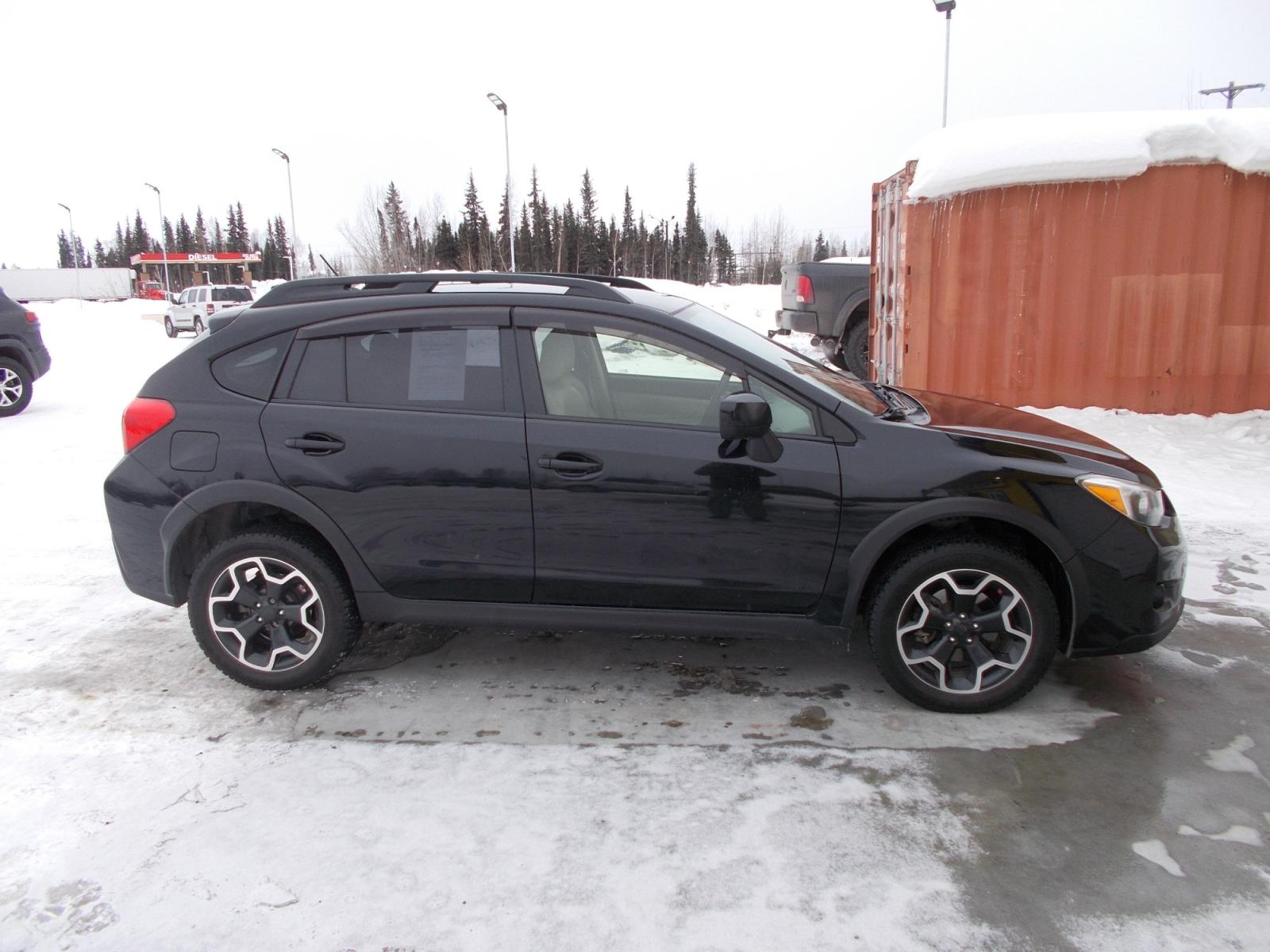 2014 Black Subaru XV Crosstrek 2.0 Limited (JF2GPAGC7EH) with an 2.0L L4 DOHC 16V engine, Continuously Variable Transmission transmission, located at 2630 Philips Field Rd., Fairbanks, AK, 99709, (907) 458-0593, 64.848068, -147.780609 - Photo #2