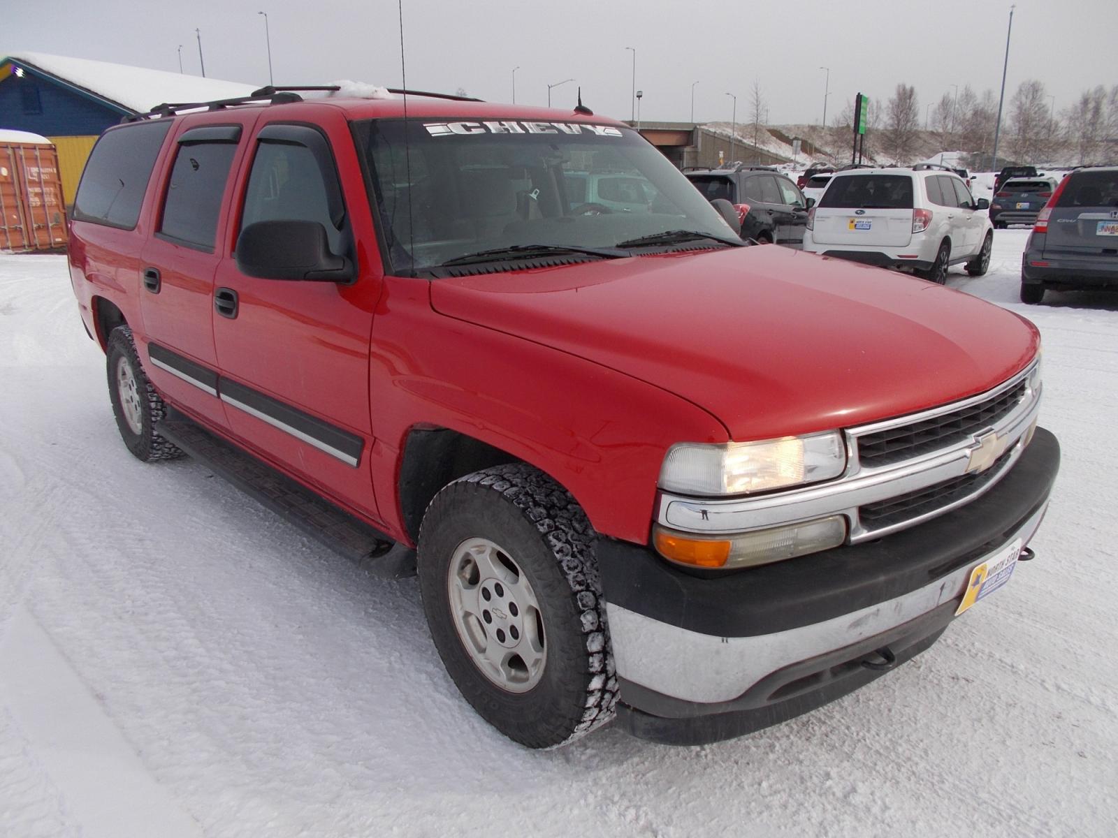 2005 Red Chevrolet Suburban 1500 4WD (1GNFK16Z65J) with an 5.3L V8 OHV 16V FFV engine, 4-Speed Automatic Overdrive transmission, located at 2630 Philips Field Rd., Fairbanks, AK, 99709, (907) 458-0593, 64.848068, -147.780609 - Photo #0