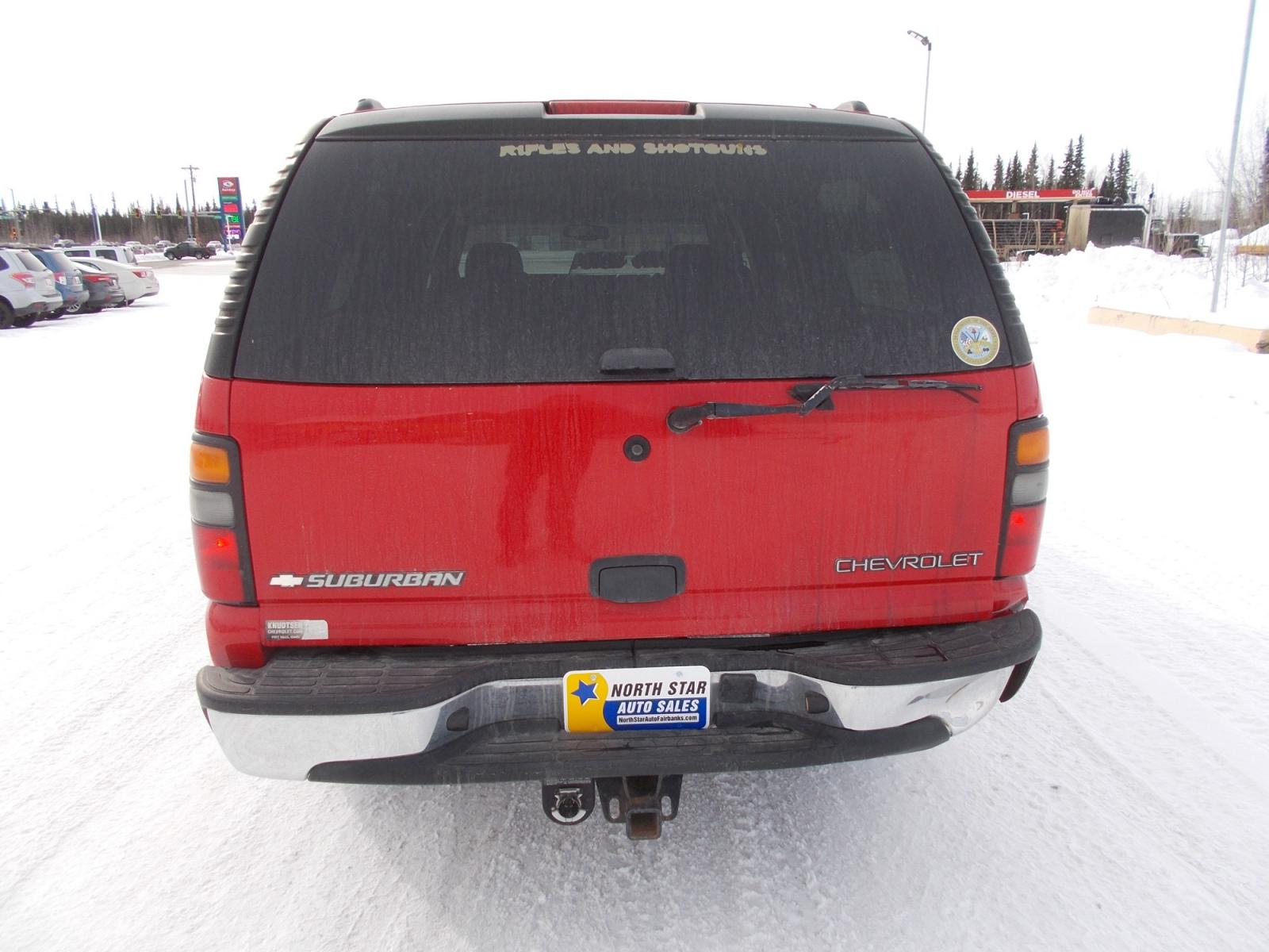 2005 Red Chevrolet Suburban 1500 4WD (1GNFK16Z65J) with an 5.3L V8 OHV 16V FFV engine, 4-Speed Automatic Overdrive transmission, located at 2630 Philips Field Rd., Fairbanks, AK, 99709, (907) 458-0593, 64.848068, -147.780609 - Photo #3