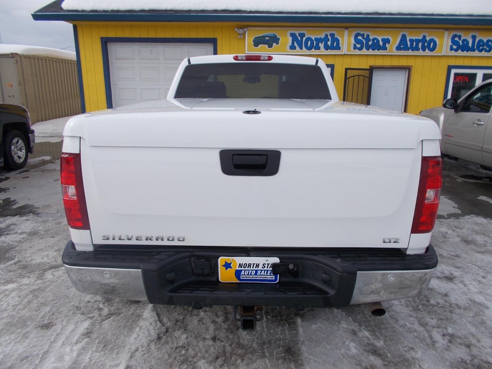 2008 White Chevrolet Silverado 1500 LT1 Ext. Cab Long Box 4WD (1GCEK19Y98Z) with an 6.0L V8 OHV 16V engine, 4-Speed Automatic Overdrive transmission, located at 2630 Philips Field Rd., Fairbanks, AK, 99709, (907) 458-0593, 64.848068, -147.780609 - Photo #2