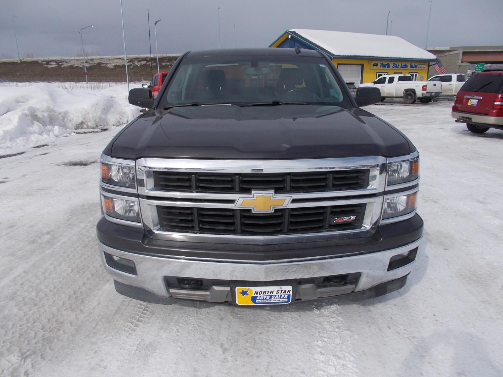 2014 Black Chevrolet Silverado 1500 1LT Double Cab 4WD (1GCVKREC7EZ) with an 5.3L V8 OHV 16V engine, 6-Speed Automatic transmission, located at 2630 Philips Field Rd., Fairbanks, AK, 99709, (907) 458-0593, 64.848068, -147.780609 - Photo #1