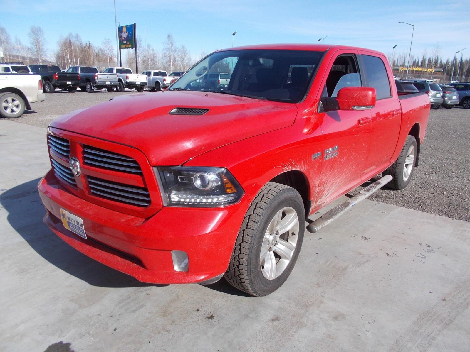 2013 Red Dodge 1500 Sport Crew Cab SWB 4WD (1C6RR7MT5DS) with an 5.7L V8 OHV 16V engine, 6-Speed Automatic transmission, located at 2630 Philips Field Rd., Fairbanks, AK, 99709, (907) 458-0593, 64.848068, -147.780609 - Photo #0