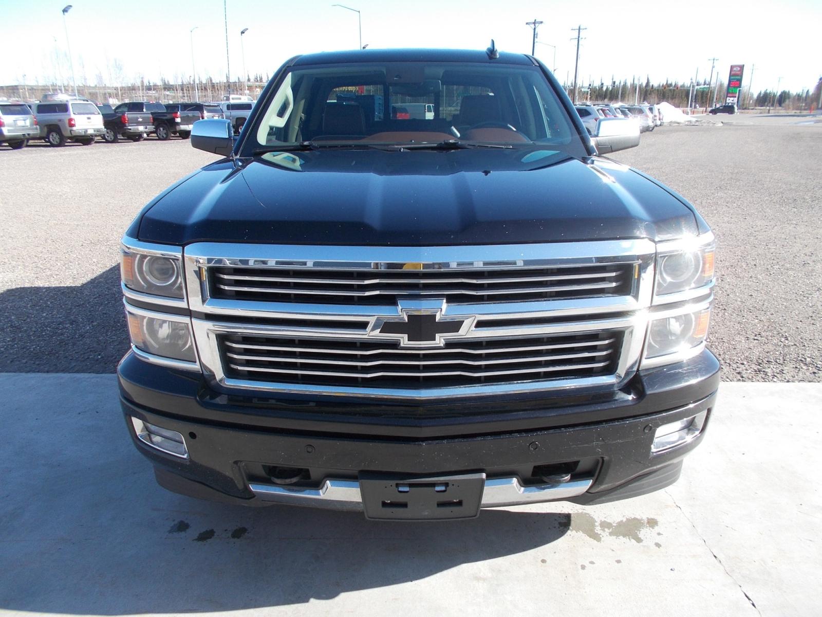 2015 Black Chevrolet Silverado 1500 High Country Crew Cab 4WD (3GCUKTEJ6FG) with an 6.2L V8 OHV 16V engine, 6-Speed Automatic transmission, located at 2630 Philips Field Rd., Fairbanks, AK, 99709, (907) 458-0593, 64.848068, -147.780609 - Photo #1