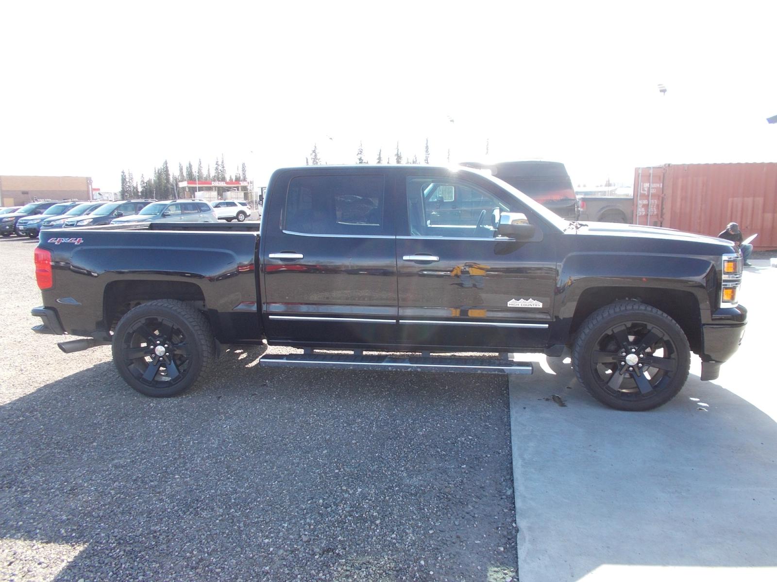 2015 Black Chevrolet Silverado 1500 High Country Crew Cab 4WD (3GCUKTEJ6FG) with an 6.2L V8 OHV 16V engine, 6-Speed Automatic transmission, located at 2630 Philips Field Rd., Fairbanks, AK, 99709, (907) 458-0593, 64.848068, -147.780609 - Photo #2