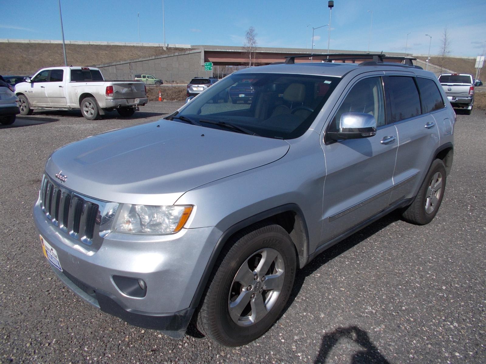 2011 Silver Jeep Grand Cherokee Limited 2WD (1J4RS5GT9BC) with an 5.7L V8 OHV 16V engine, 5-Speed Automatic transmission, located at 2630 Philips Field Rd., Fairbanks, AK, 99709, (907) 458-0593, 64.848068, -147.780609 - Photo #0