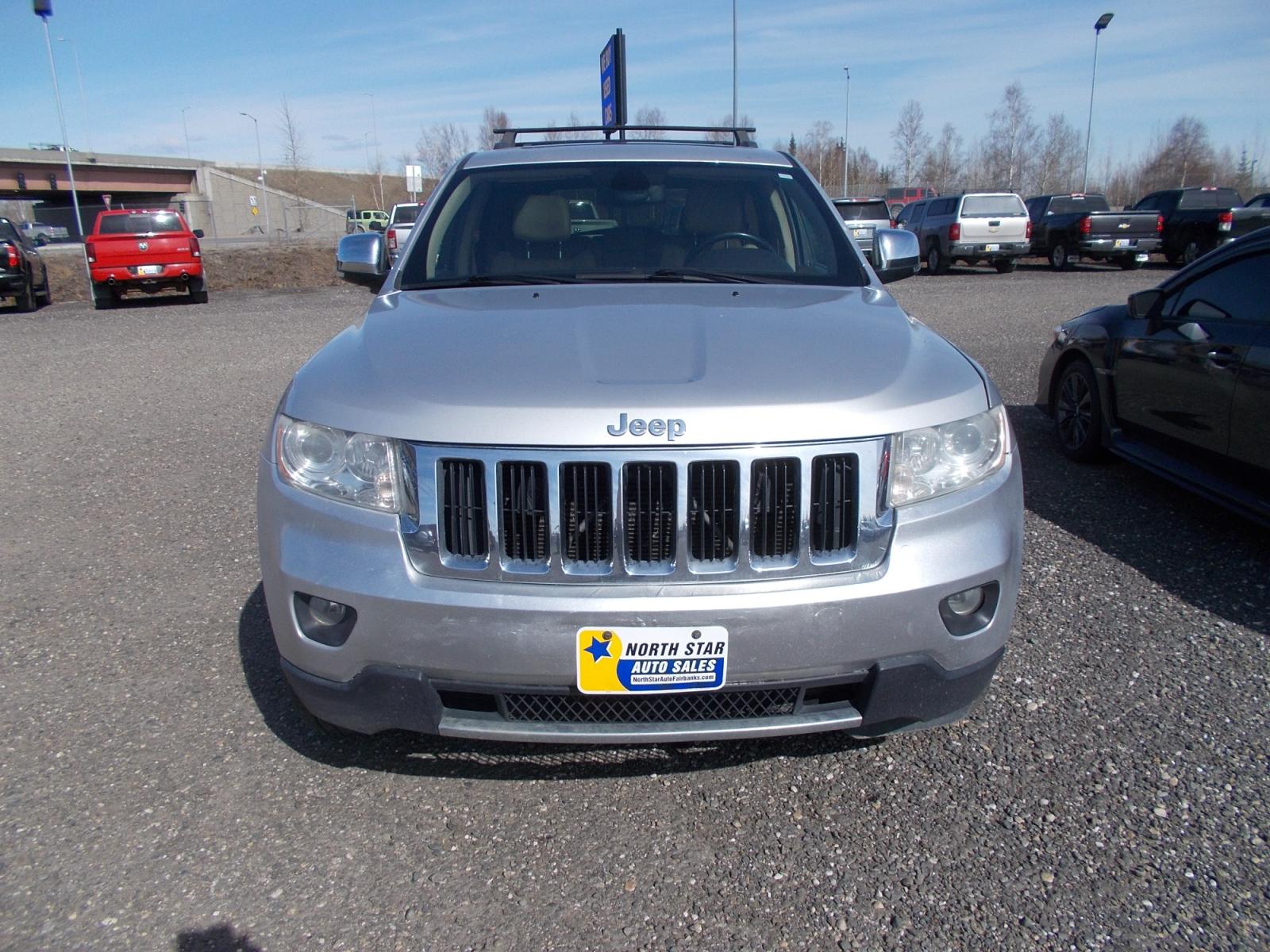 2011 Silver Jeep Grand Cherokee Limited 2WD (1J4RS5GT9BC) with an 5.7L V8 OHV 16V engine, 5-Speed Automatic transmission, located at 2630 Philips Field Rd., Fairbanks, AK, 99709, (907) 458-0593, 64.848068, -147.780609 - Photo #1
