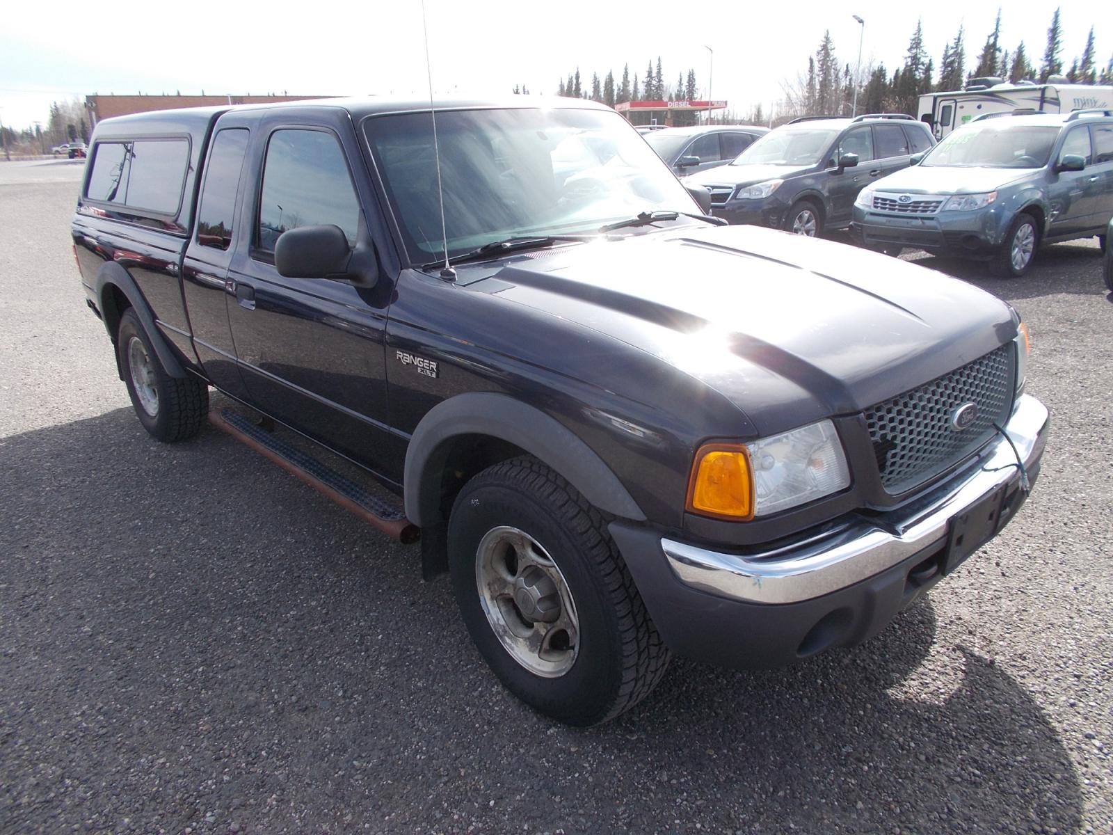 2003 Blue Ford Ranger Edge Plus SuperCab 4WD (1FTZR45E63P) with an 4.0L V6 SOHC 12V engine, located at 2630 Philips Field Rd., Fairbanks, AK, 99709, (907) 458-0593, 64.848068, -147.780609 - Photo #0