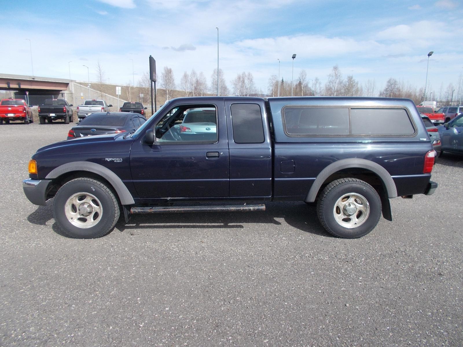 2003 Blue Ford Ranger Edge Plus SuperCab 4WD (1FTZR45E63P) with an 4.0L V6 SOHC 12V engine, located at 2630 Philips Field Rd., Fairbanks, AK, 99709, (907) 458-0593, 64.848068, -147.780609 - Photo #2
