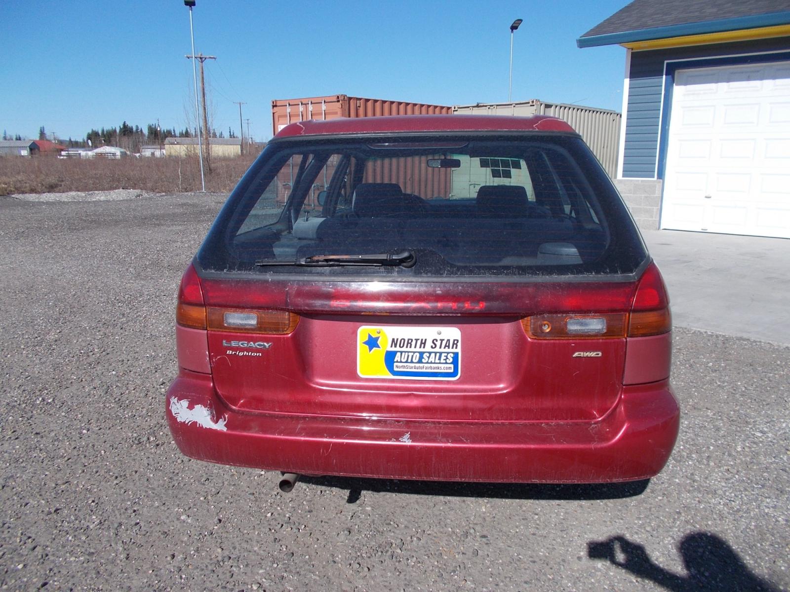 1997 Red Subaru Legacy Wagon Brighton AWD (4S3BK4259V7) with an 2.2L H4 SOHC 16V engine, 4-Speed Automatic Overdrive transmission, located at 2630 Philips Field Rd., Fairbanks, AK, 99709, (907) 458-0593, 64.848068, -147.780609 - Photo #3