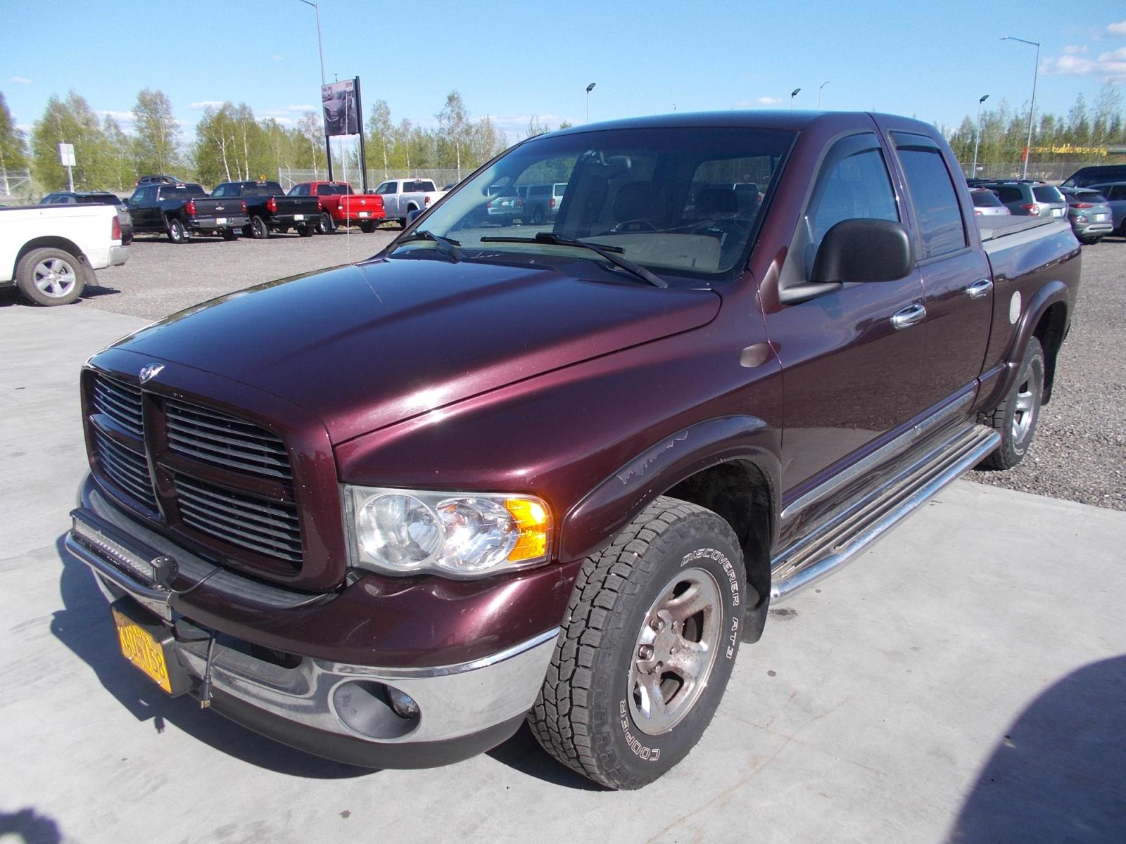 2004 Dodge Ram 1500 Laramie Quad Cab 4WD (1D3HU18D74J) with an 5.7L V8 OHV 16V engine, 5-Speed Automatic Overdrive transmission, located at 2630 Philips Field Rd., Fairbanks, AK, 99709, (907) 458-0593, 64.848068, -147.780609 - Photo #0