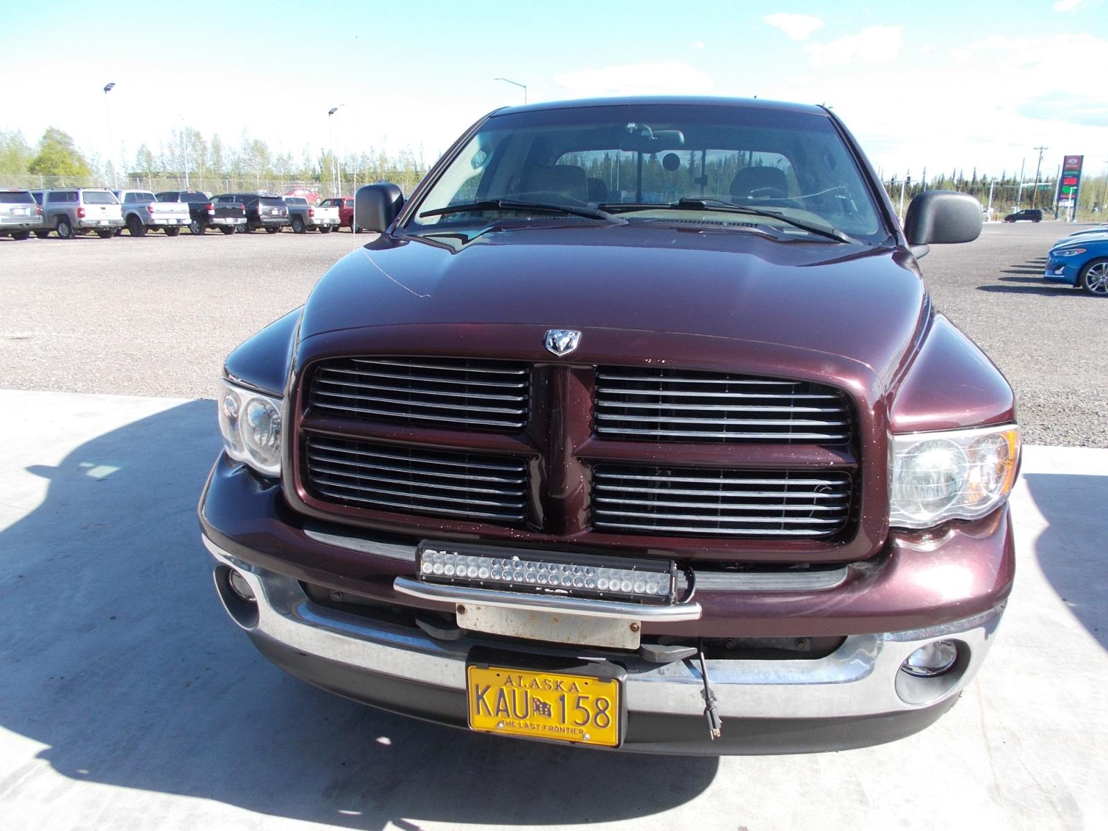 2004 Dodge Ram 1500 Laramie Quad Cab 4WD (1D3HU18D74J) with an 5.7L V8 OHV 16V engine, 5-Speed Automatic Overdrive transmission, located at 2630 Philips Field Rd., Fairbanks, AK, 99709, (907) 458-0593, 64.848068, -147.780609 - Photo #1