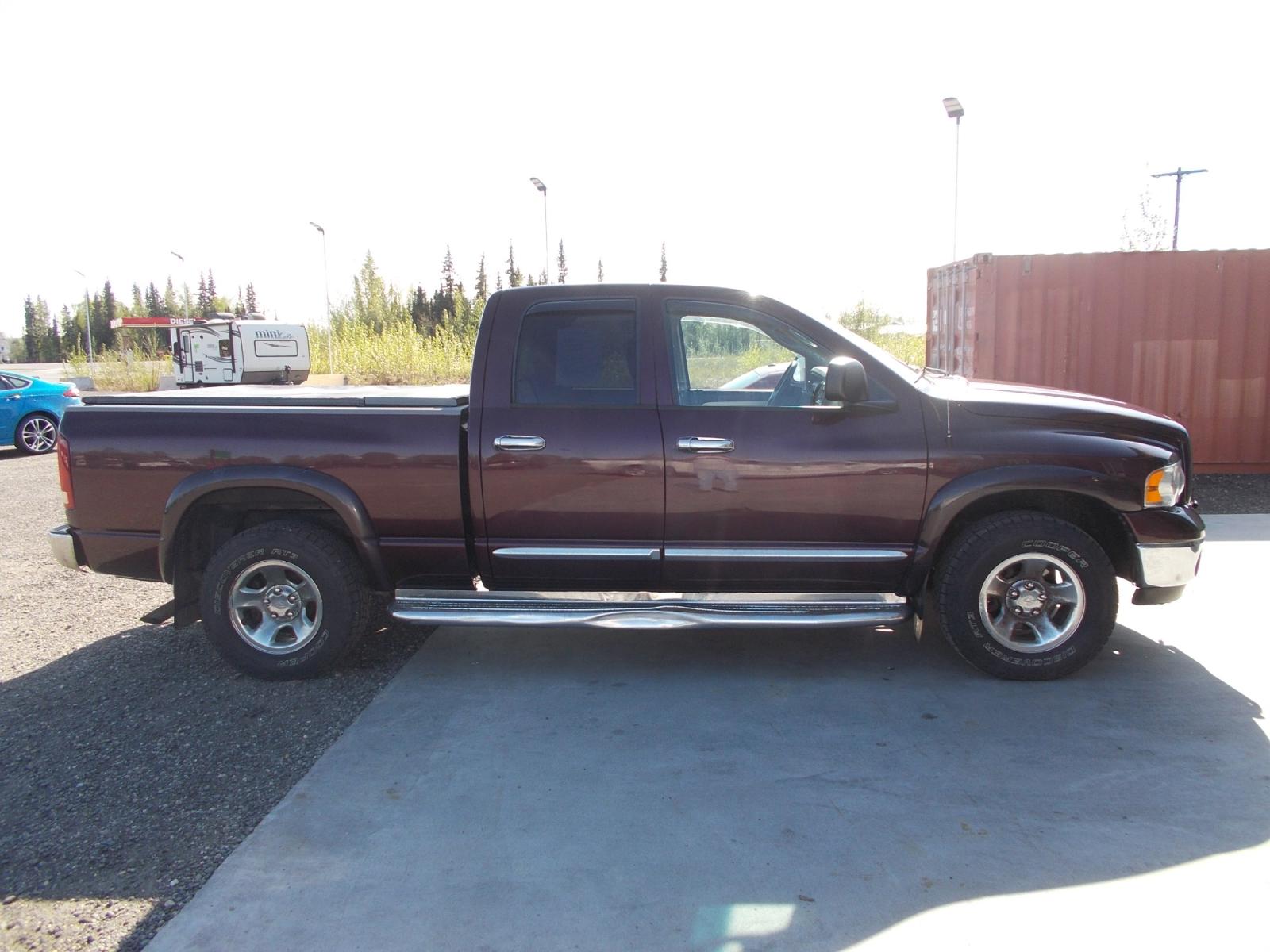 2004 Dodge Ram 1500 Laramie Quad Cab 4WD (1D3HU18D74J) with an 5.7L V8 OHV 16V engine, 5-Speed Automatic Overdrive transmission, located at 2630 Philips Field Rd., Fairbanks, AK, 99709, (907) 458-0593, 64.848068, -147.780609 - Photo #2