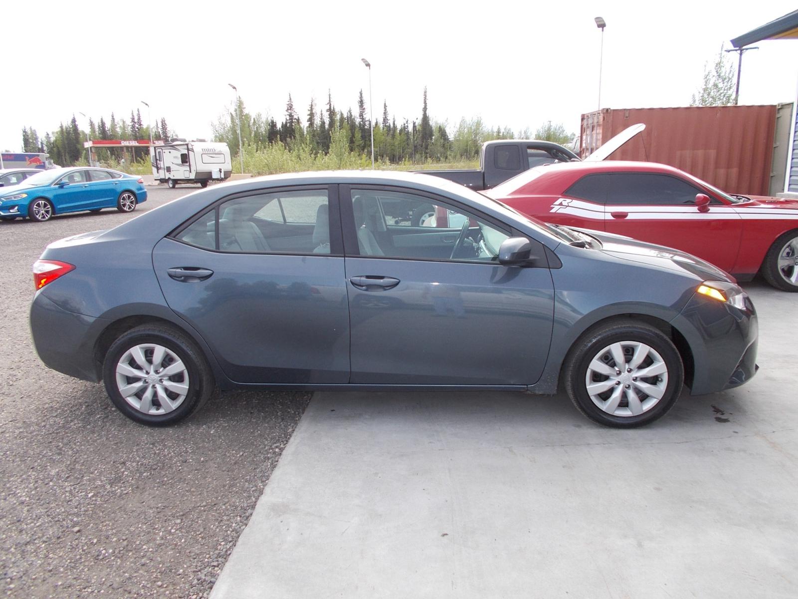 2016 Grey Toyota Corolla L 4-Speed AT (2T1BURHE5GC) with an 1.8L L4 DOHC 16V engine, 4A transmission, located at 2630 Philips Field Rd., Fairbanks, AK, 99709, (907) 458-0593, 64.848068, -147.780609 - Photo #2