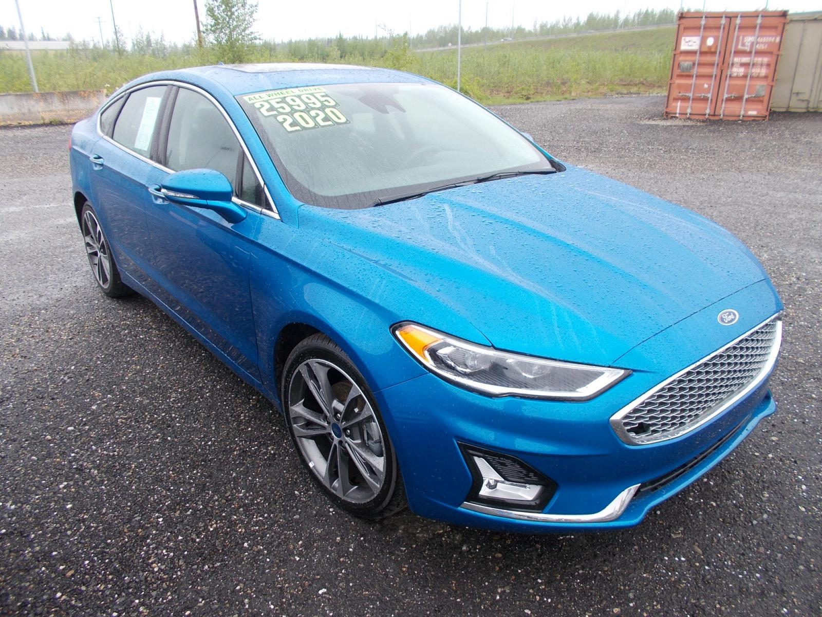 2020 Blue Ford Fusion Titanium AWD (3FA6P0D90LR) with an 2.0L L4 DOHC 16V engine, 6A transmission, located at 2630 Philips Field Rd., Fairbanks, AK, 99709, (907) 458-0593, 64.848068, -147.780609 - Photo #0