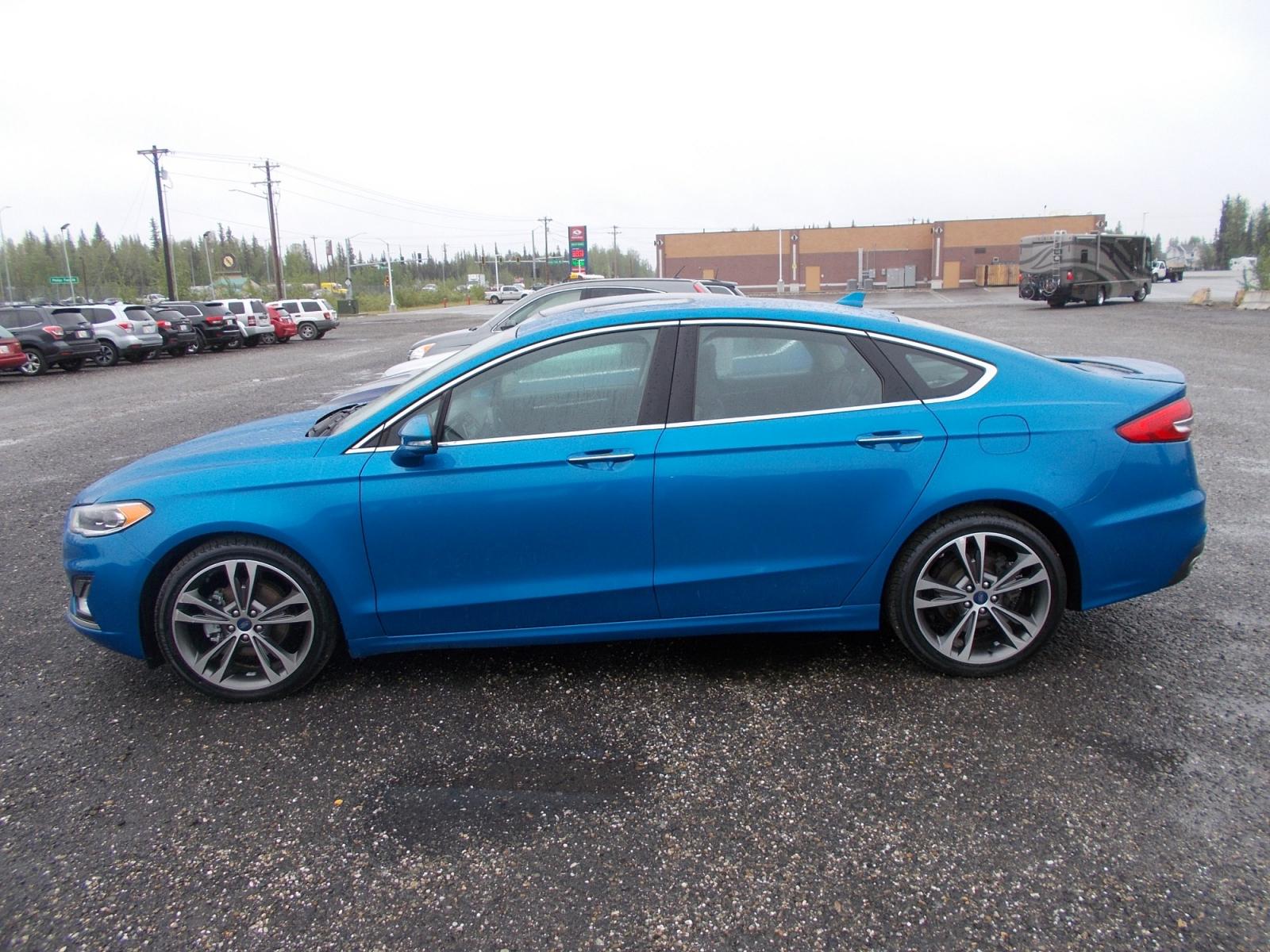 2020 Blue Ford Fusion Titanium AWD (3FA6P0D90LR) with an 2.0L L4 DOHC 16V engine, 6A transmission, located at 2630 Philips Field Rd., Fairbanks, AK, 99709, (907) 458-0593, 64.848068, -147.780609 - Photo #2