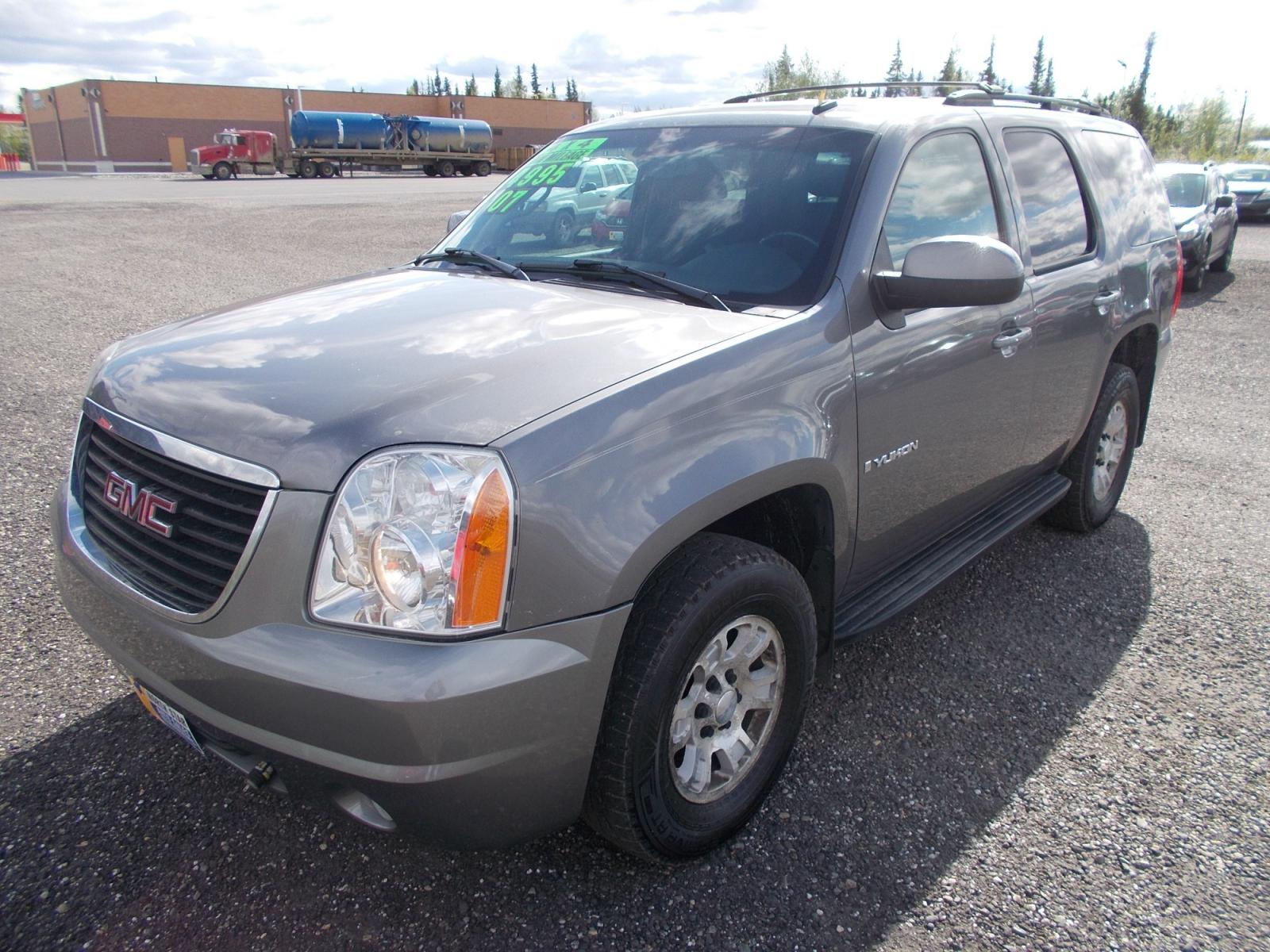 2007 Grey GMC Yukon 4WD (1GKFK13067J) with an 5.3L V8 OHV 16V FFV engine, 4-Speed Automatic Overdrive transmission, located at 2630 Philips Field Rd., Fairbanks, AK, 99709, (907) 458-0593, 64.848068, -147.780609 - Photo #0
