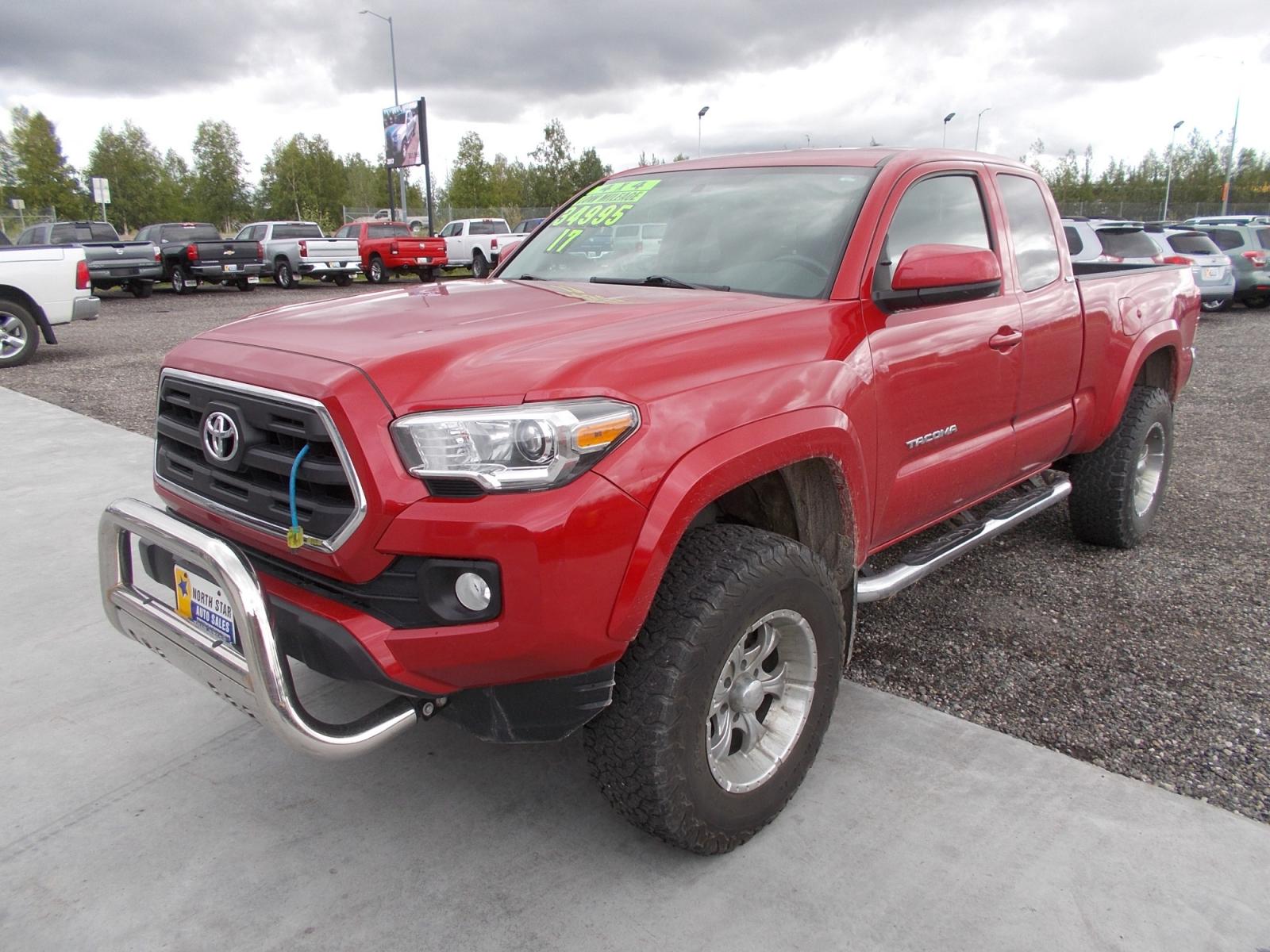 2017 Red Toyota Tacoma SR5 Access Cab V6 6AT 4WD (5TFSZ5AN6HX) with an 3.5L V6 DOHC 24V engine, 6A transmission, located at 2630 Philips Field Rd., Fairbanks, AK, 99709, (907) 458-0593, 64.848068, -147.780609 - Photo #0