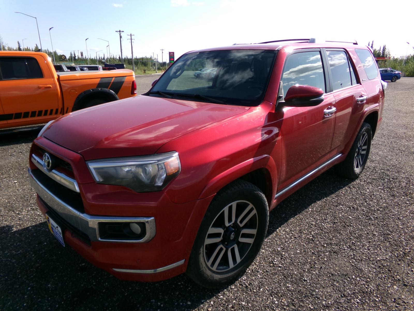 2014 Red /Black Toyota 4Runner SR5 Limited (JTEBU5JR0E5) with an 4.0L V6 engine, 5-Speed Automatic transmission, located at 2630 Philips Field Rd., Fairbanks, AK, 99709, (907) 458-0593, 64.848068, -147.780609 - Photo #2
