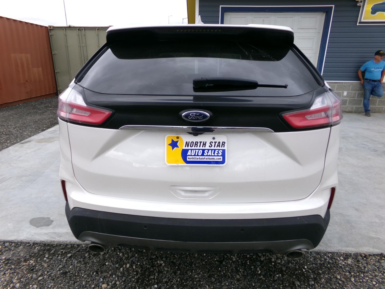 2019 White Ford Edge Titanium AWD (2FMPK4K94KB) with an 2.0L L4 DOHC 16V engine, 6A transmission, located at 2630 Philips Field Rd., Fairbanks, AK, 99709, (907) 458-0593, 64.848068, -147.780609 - Photo #3